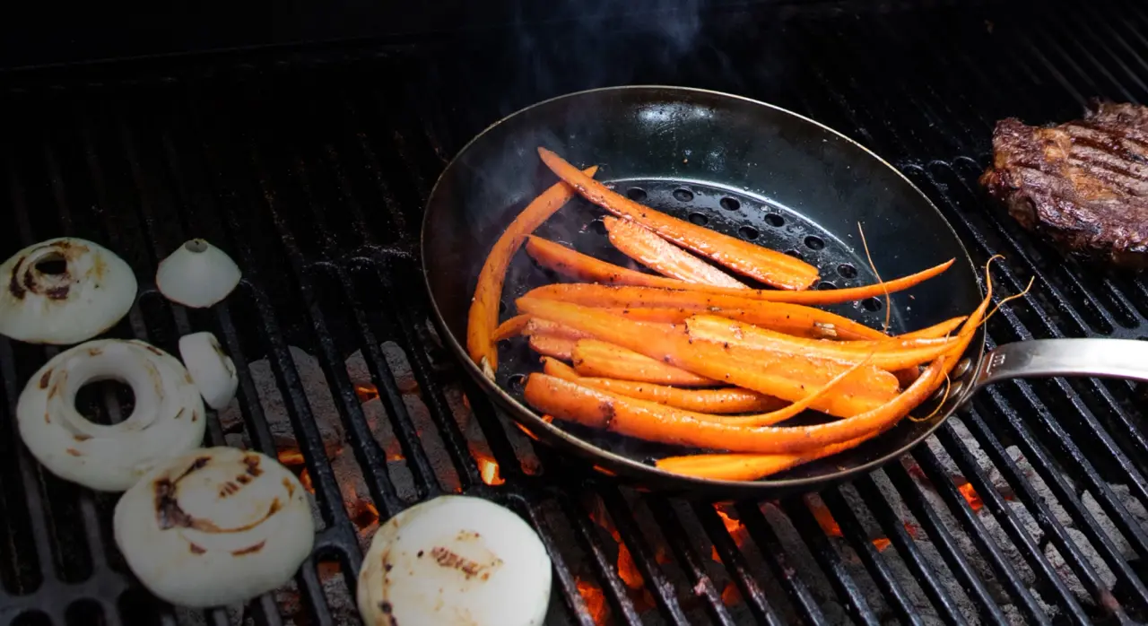carrots in carbon steel on grill