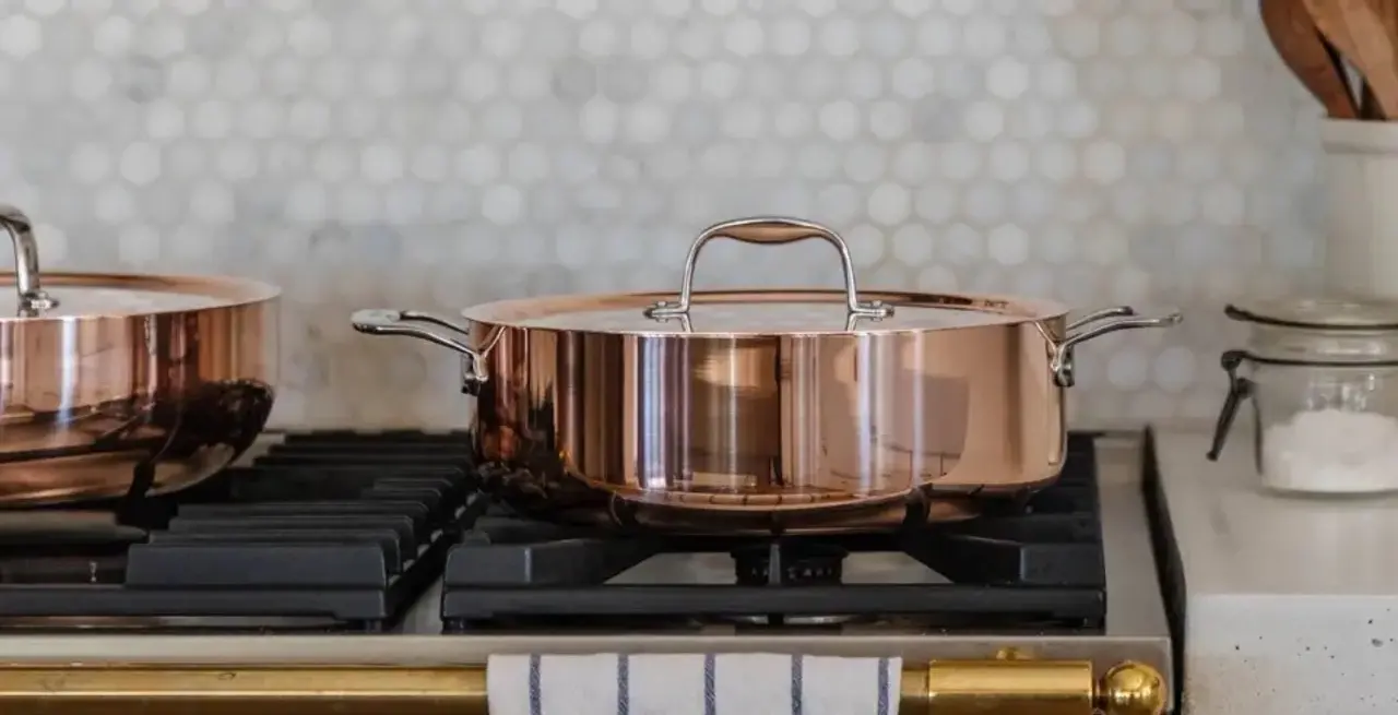 copper rondeau on stove