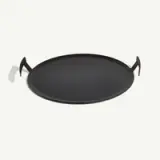 A black round paella pan with two handles attached to opposite sides.