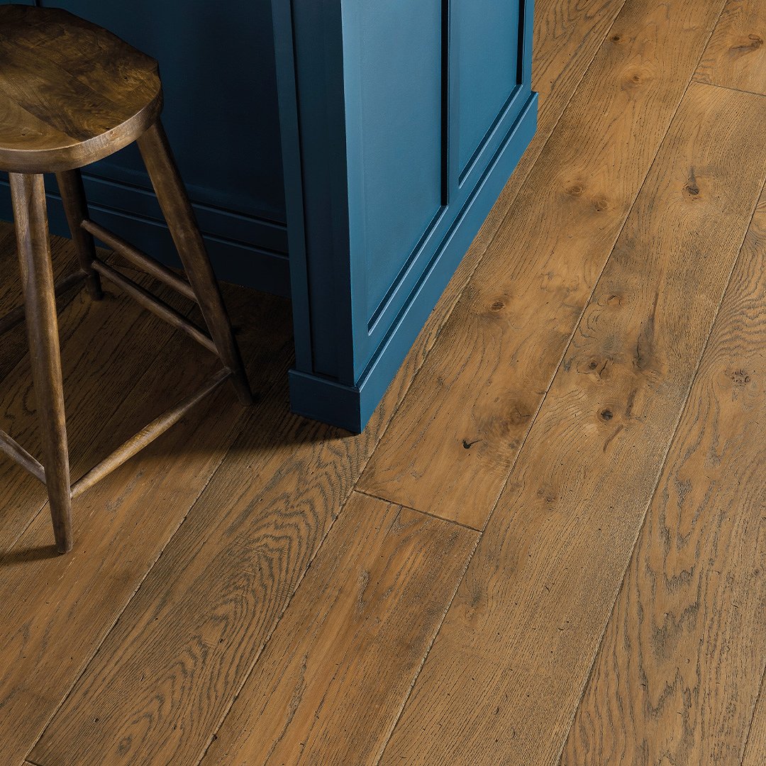 Plank wood flooring in a kitchen area