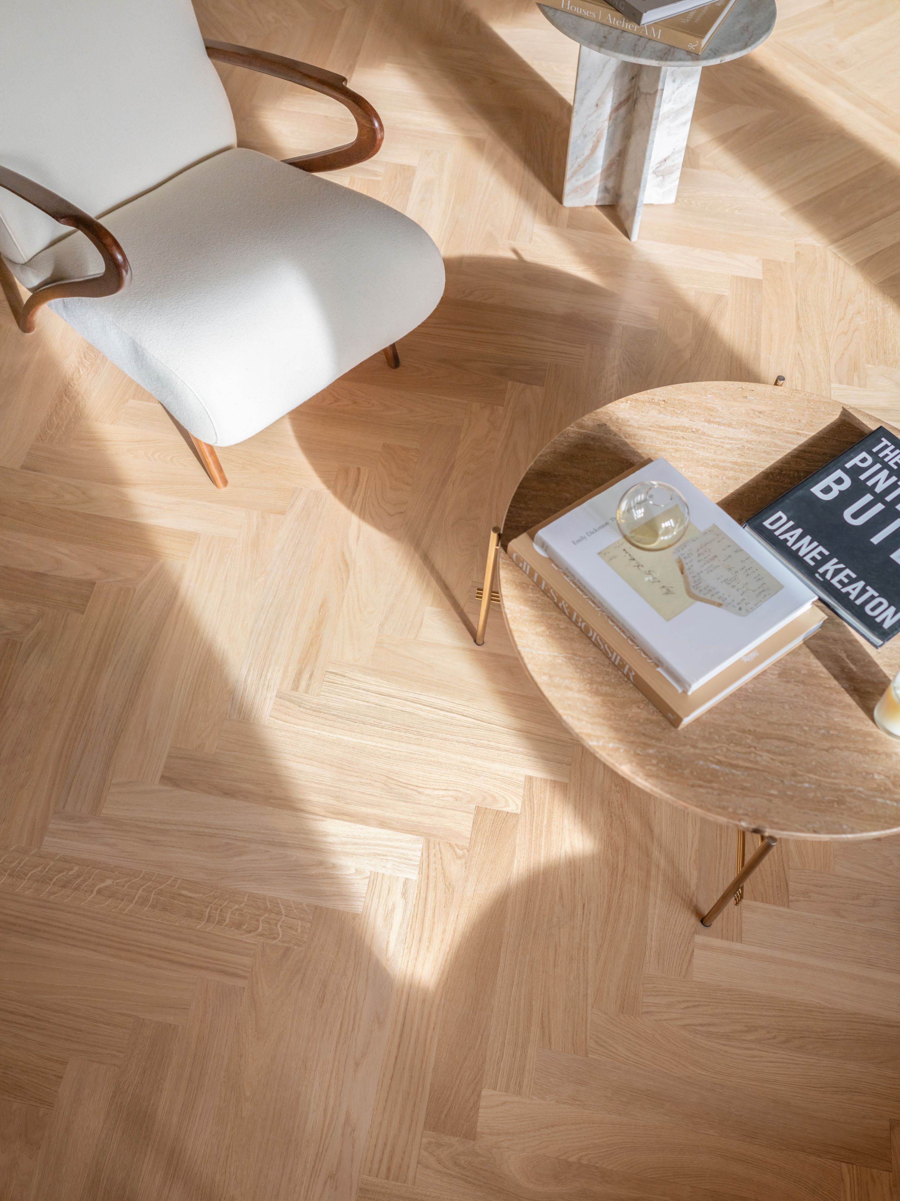 Herringbone wood flooring in a seatin area