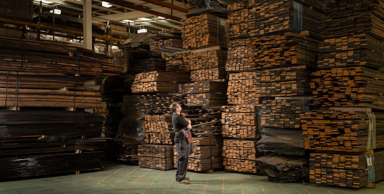 Stacks of reclaimed timber in the Woodworks warehouse