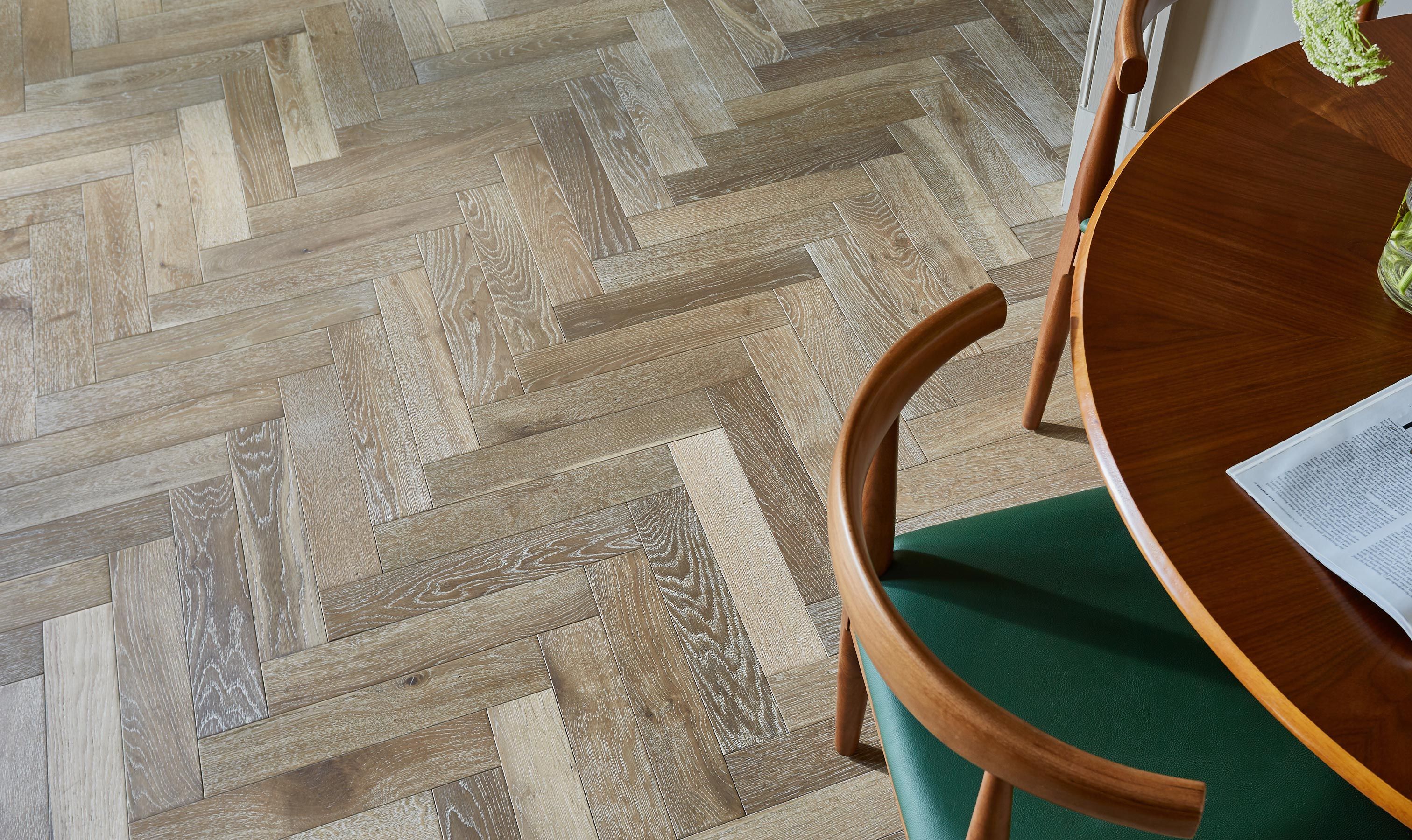 Herringbone wood flooring in a seating area