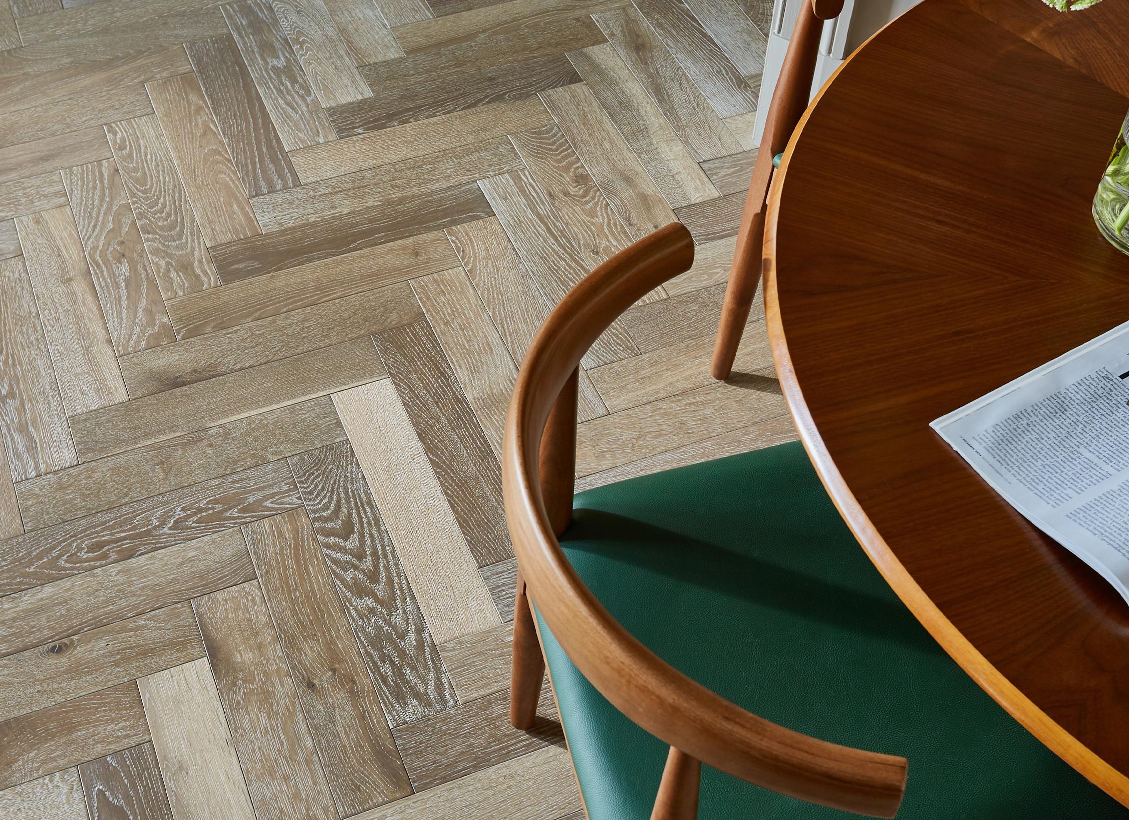 Herringbone wood flooring in a seating area