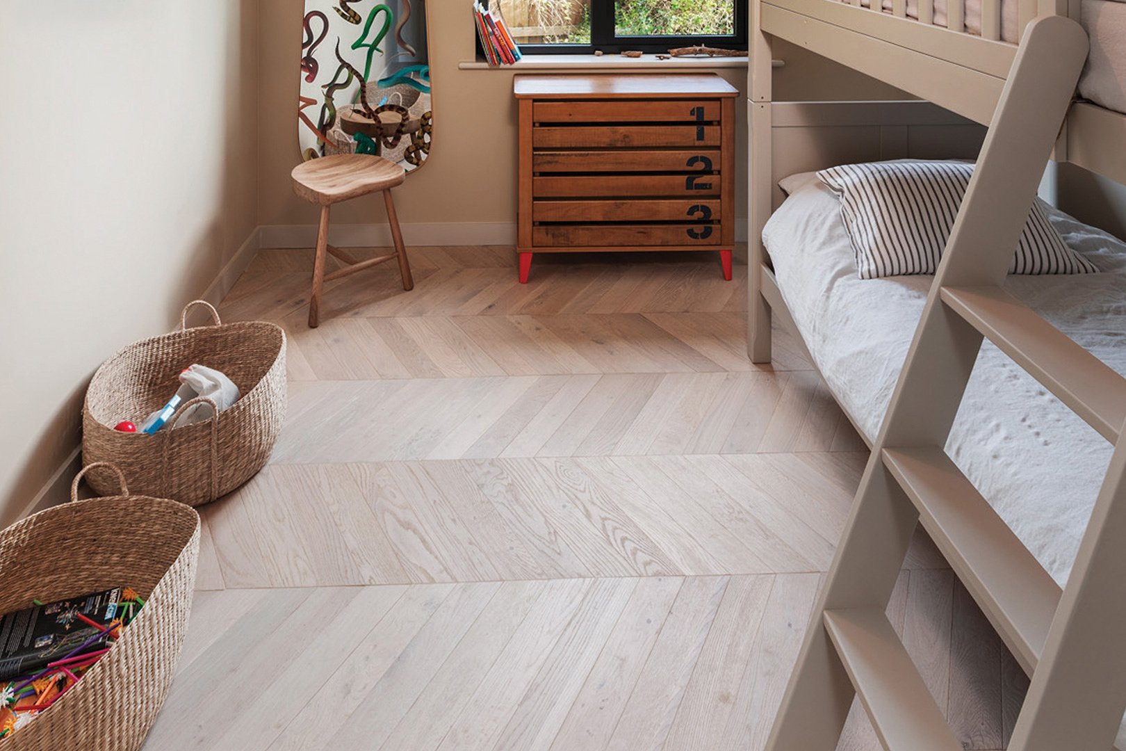 Chevron inspired wood flooring room setting