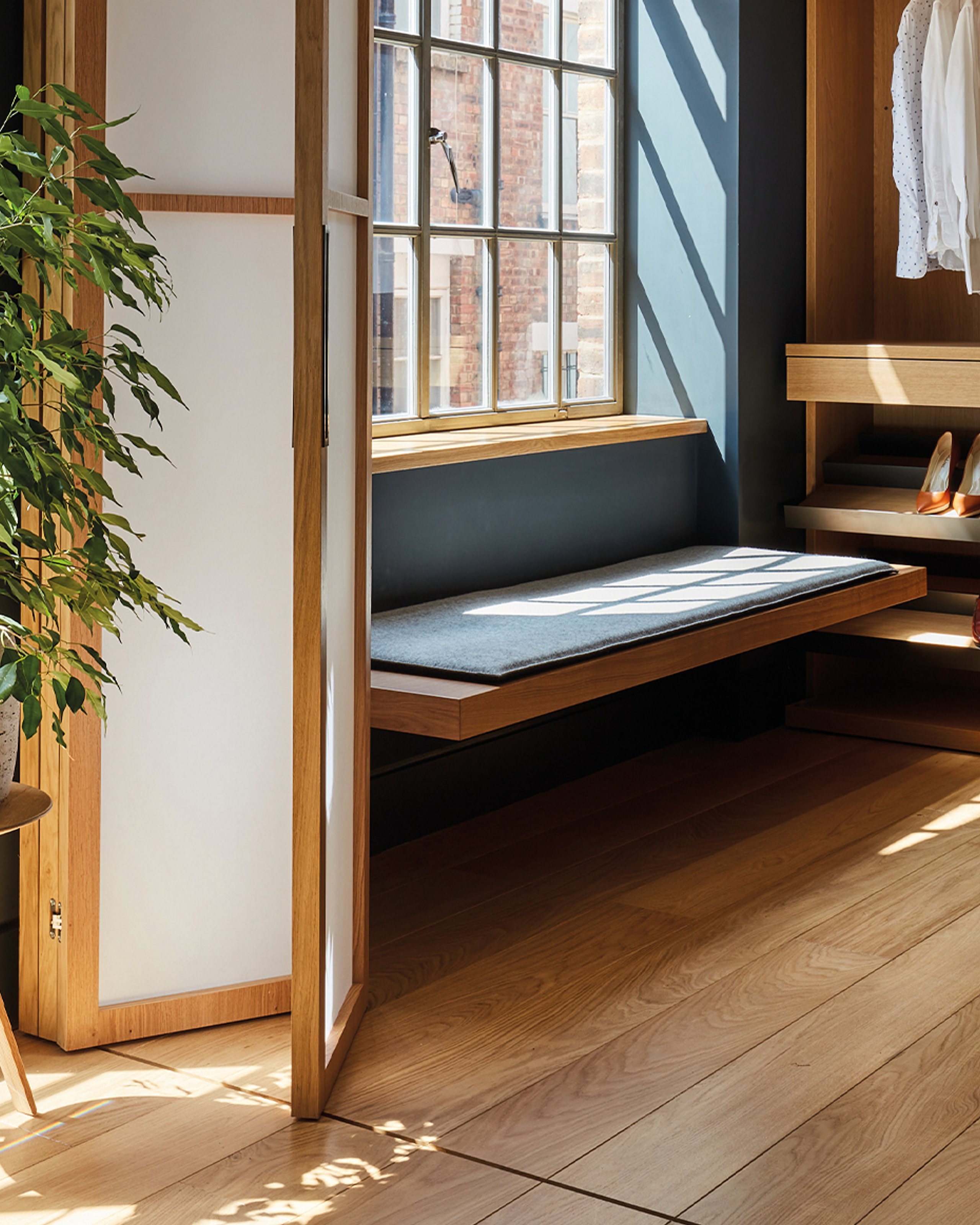 Extra wide plank wood floor across a sunlit living space