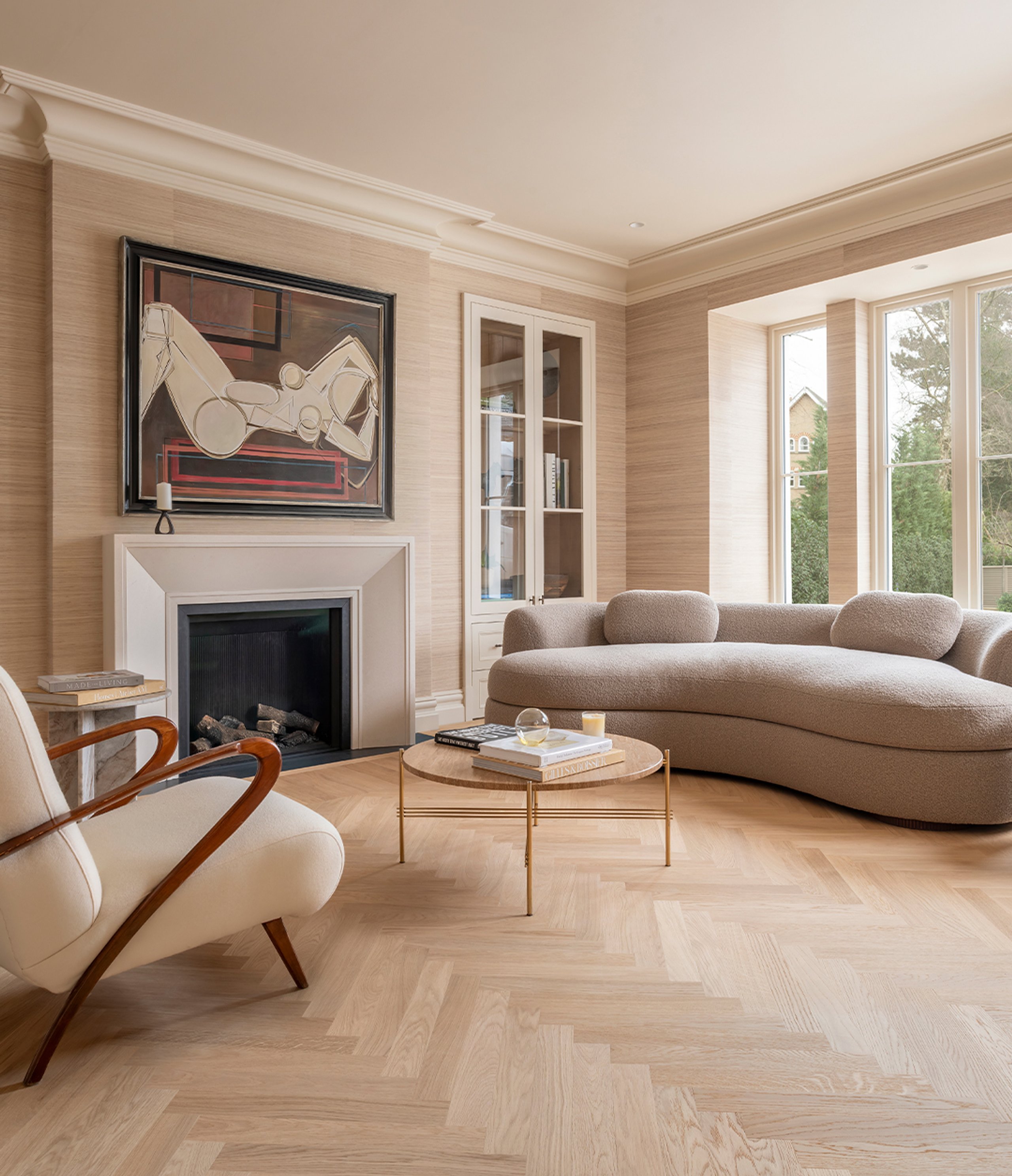 Herringbone wood flooring in a seatin area
