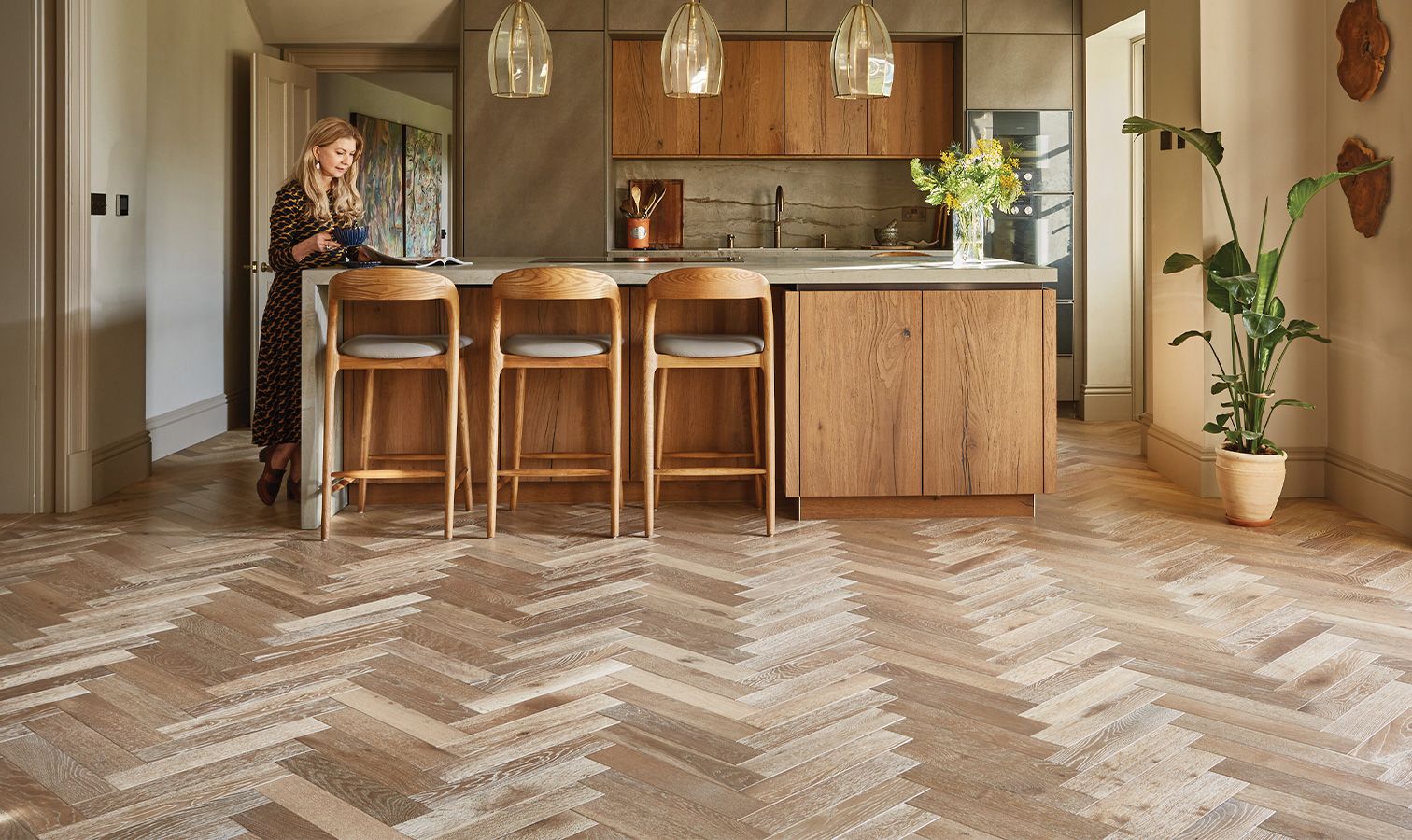 Kitchen with layered Ted Todd wood flooring