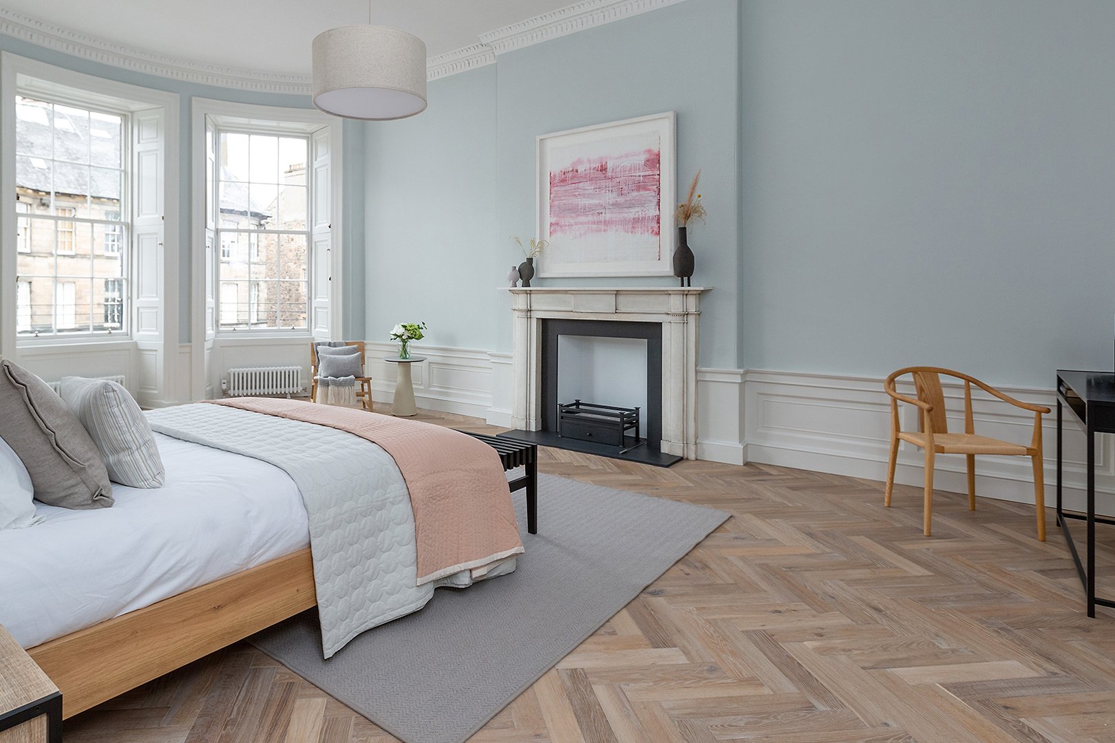 Parquet inspired wood flooring room setting
