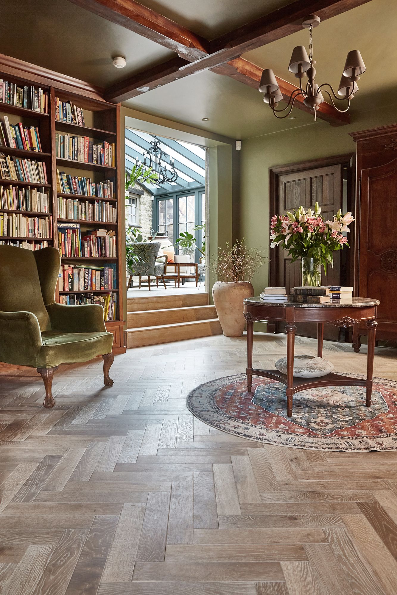 Herringbone wood flooring in a seating area