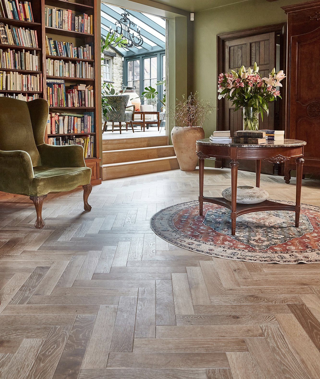 Herringbone wood flooring in a seating area