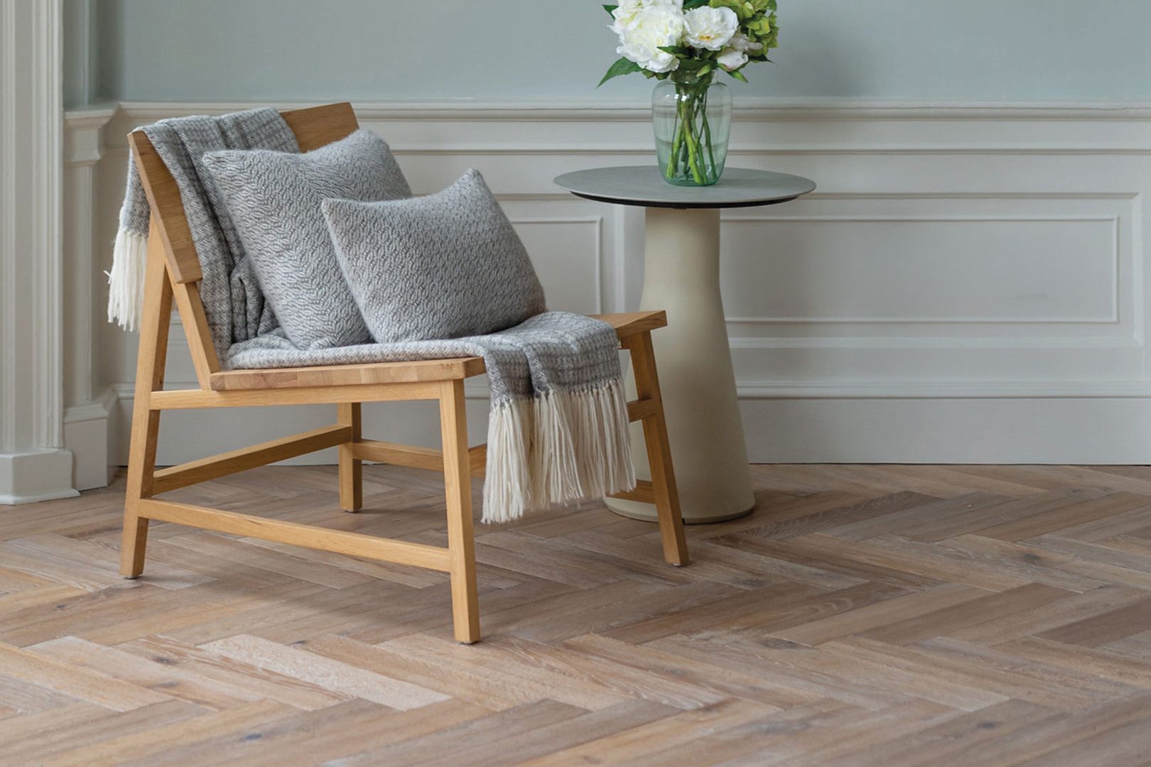 Herringbone wood flooring room setting