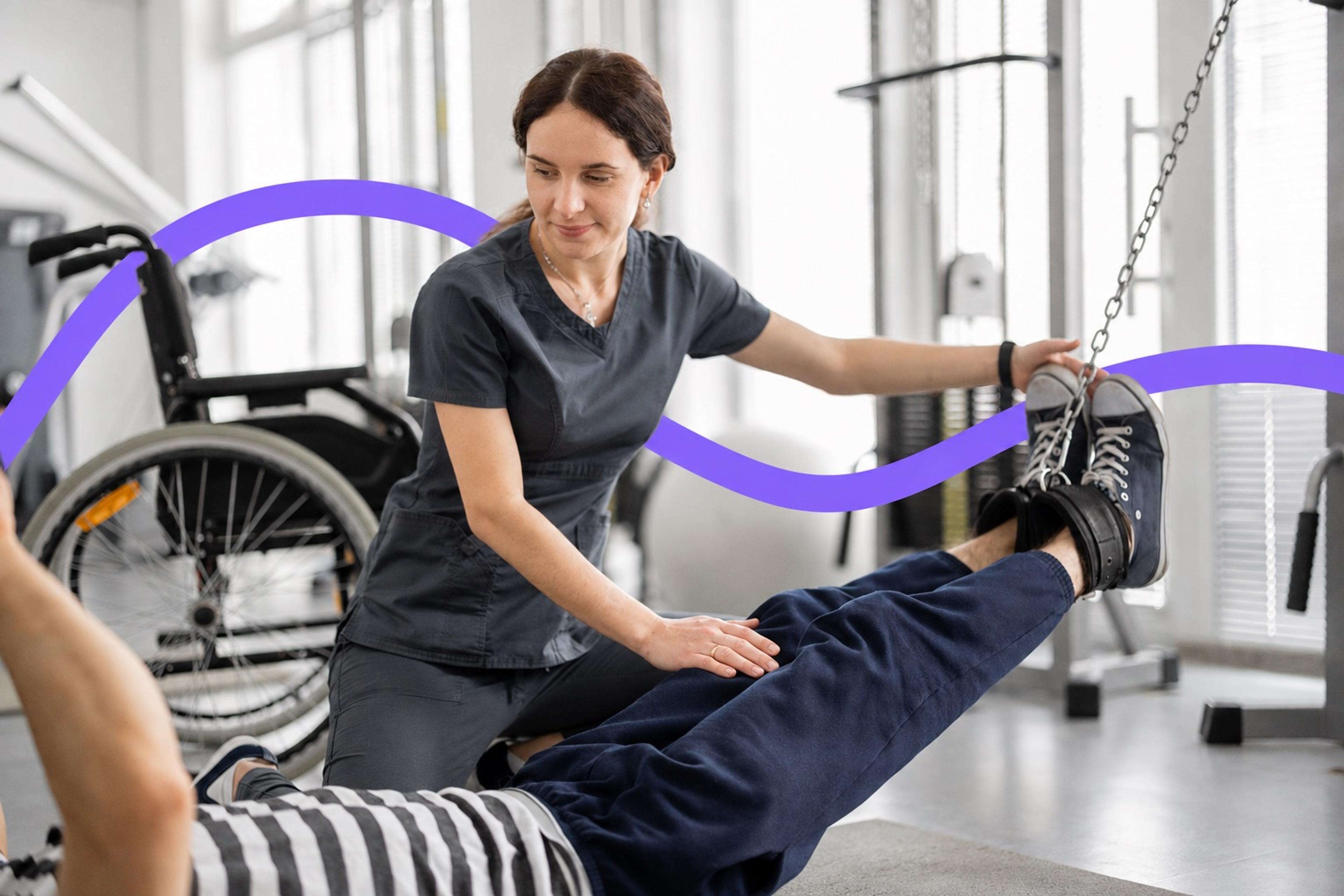 A physical therapist helping a patient with a leg-strengthening exercise in a rehabilitation gym