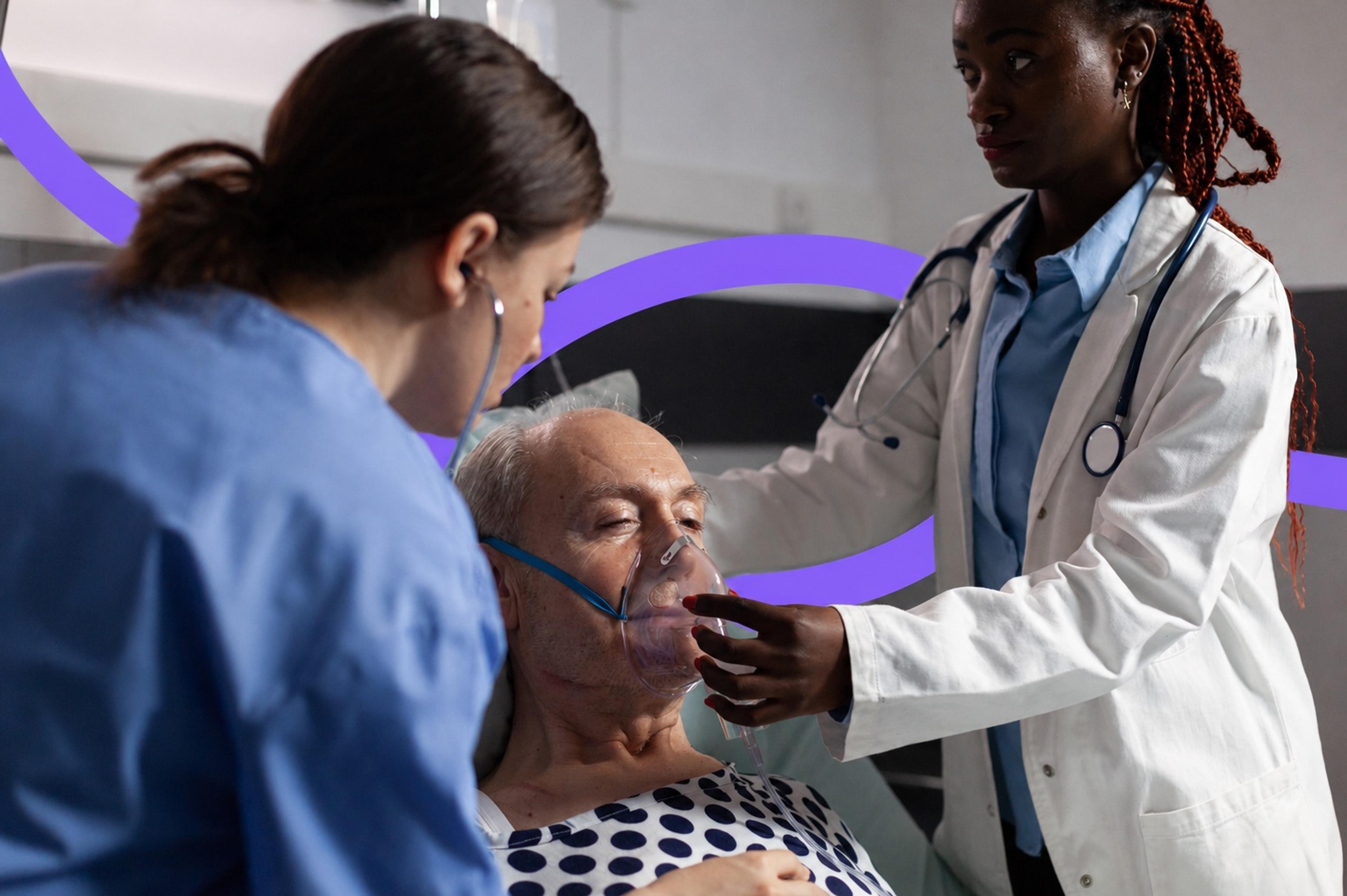 A respiratory therapist fitting an oxygen mask on an older patient in a hospital bed
