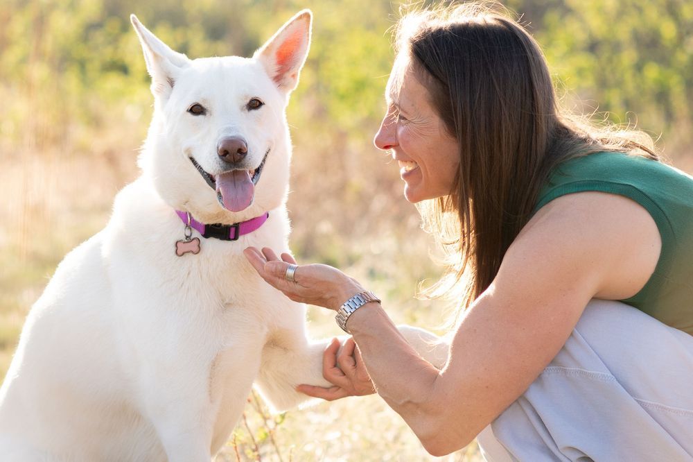 Karina and a White Dog