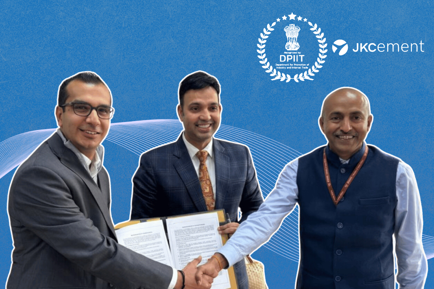 Three individuals wearing formal attire are captured during a handshake and document exchange. The background is blue, featuring the logos of DPIIT (Department for Promotion of Industry and Internal Trade) and JK Cement. A subtle wave design adds visual interest.