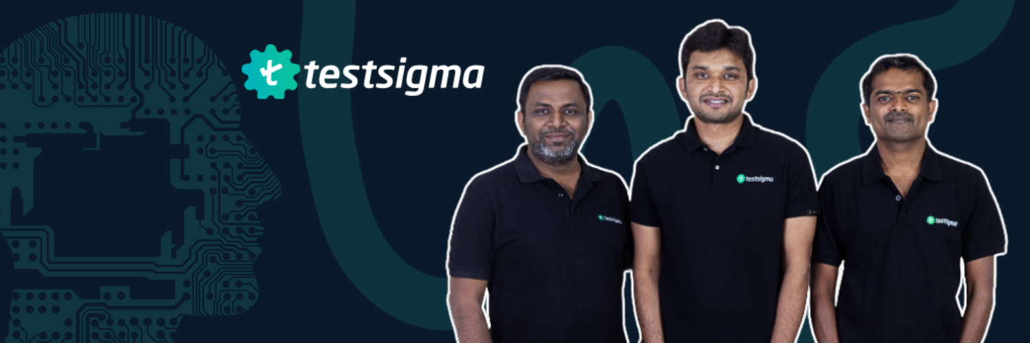 The image features a promotional banner for Testsigma, showcasing three of its founders against a dark backdrop overlaid with circuit board designs. From left to right, the founders displayed are Rukmangada Kandyala, Pratheep Velicherla, and Vikram Chaitanya, all wearing black polo shirts with the Testsigma logo. The Testsigma logo is also displayed prominently on the left side of the image, symbolizing the company's focus on tech innovation.
