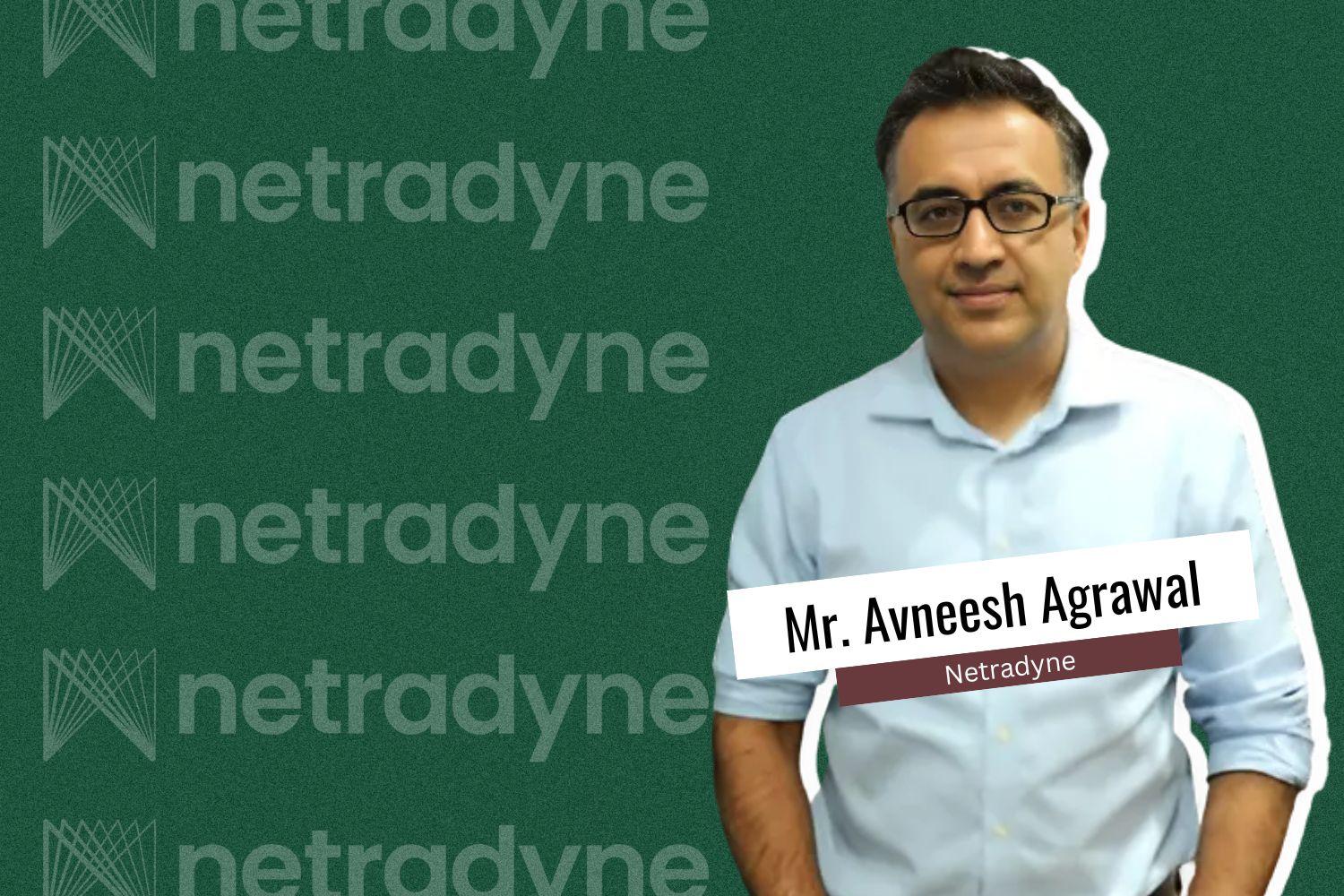 Mr. Avneesh Agrawal, wearing glasses and a light blue shirt, standing against a green background. The background features a repeated "Netradyne" logo pattern, and his name is prominently displayed along with the company name.