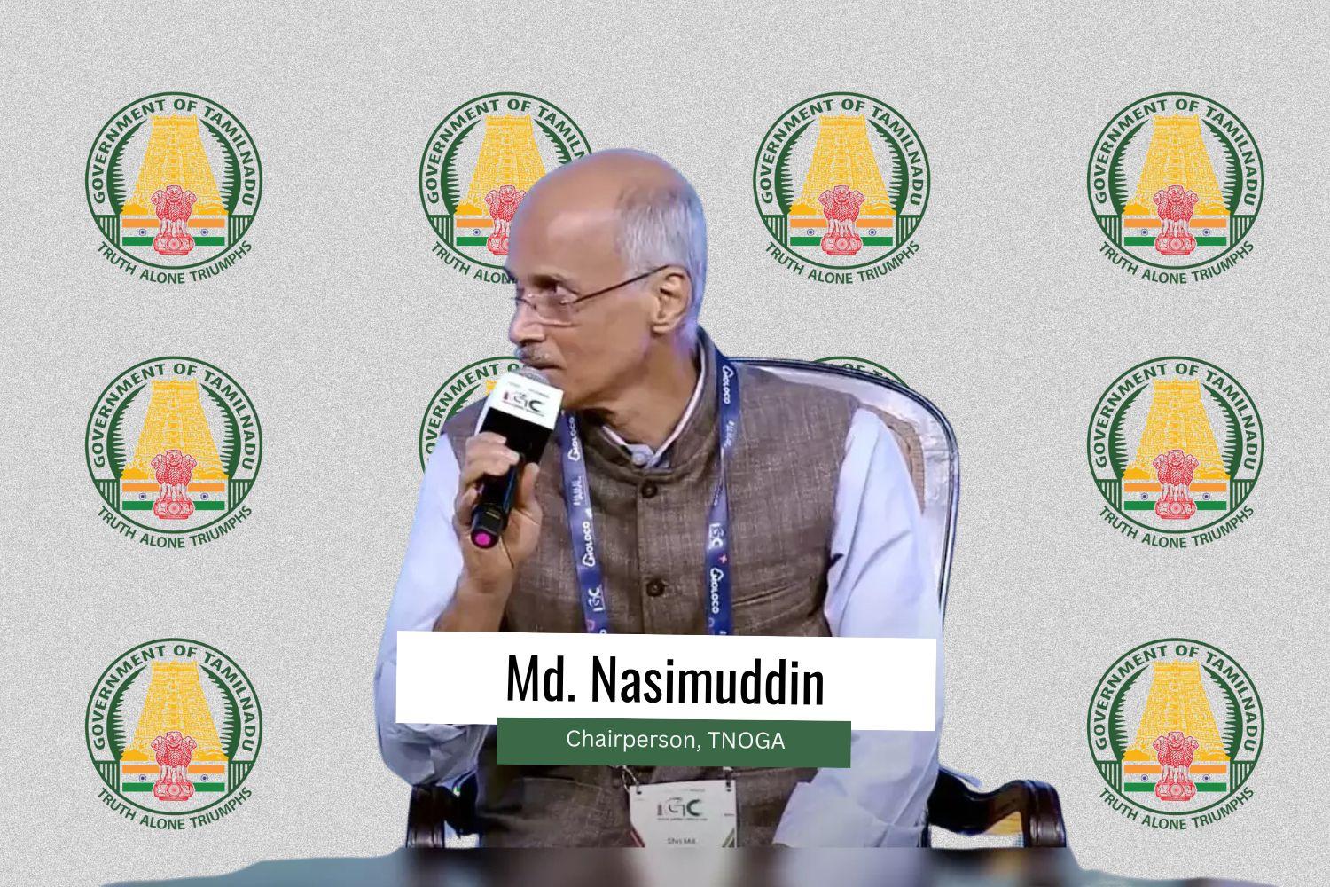 The image features Md. Nasimuddin, Chairperson of TNOGA, speaking into a microphone while seated on a stage. He is wearing a brown vest over a white shirt and has a conference lanyard around his neck. The background features multiple logos of the Government of Tamil Nadu, with the emblem and the phrase "Truth Alone Triumphs." A white and green text box at the bottom displays his name and title: "Md. Nasimuddin, Chairperson, TNOGA."