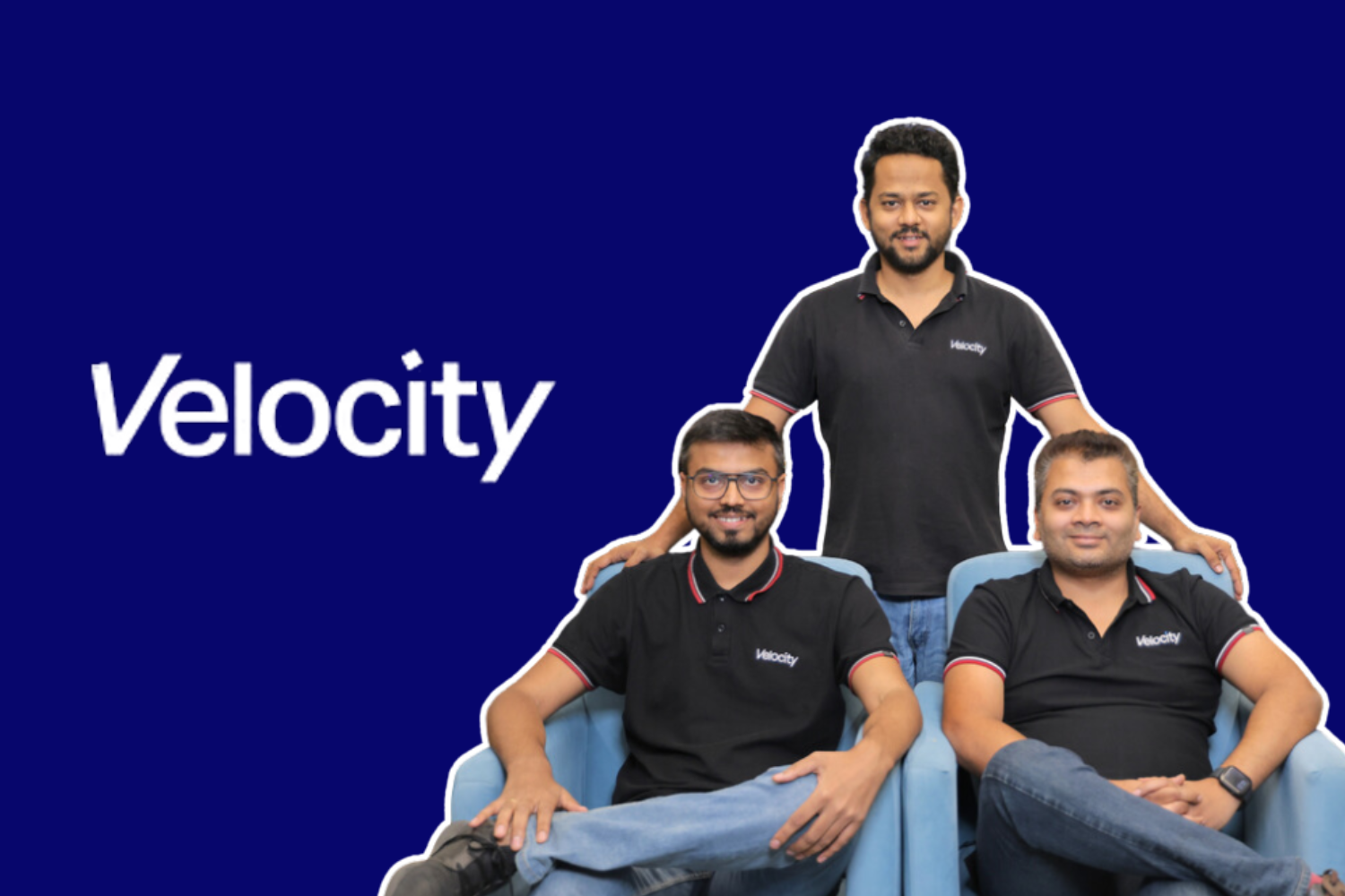 Velocity's core team radiates innovation and readiness, seated comfortably in a modern setup with a sharp blue backdrop highlighting their brand.