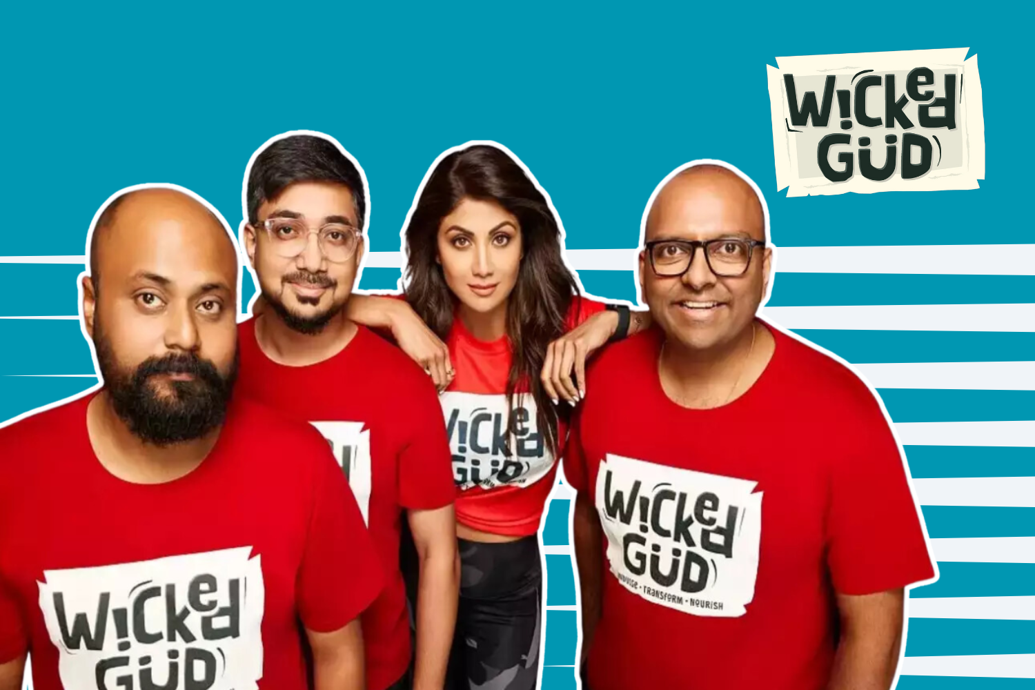 A promotional banner featuring the WickedGud logo on a blue striped background, with the co-founders and brand ambassador wearing branded red T-shirts. The design highlights the brand's vibrant and healthy snacking theme.