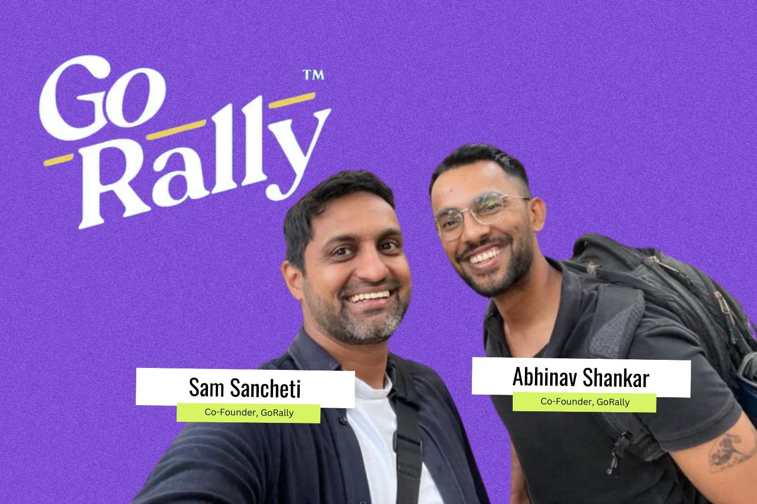 A digital graphic featuring two smiling co-founders, Sam Sancheti and Abhinav Shankar, of "GoRally." The background is purple with the company’s name in a playful white font with a yellow accent. Both founders are casually dressed, carrying backpacks, and have name labels with their titles.