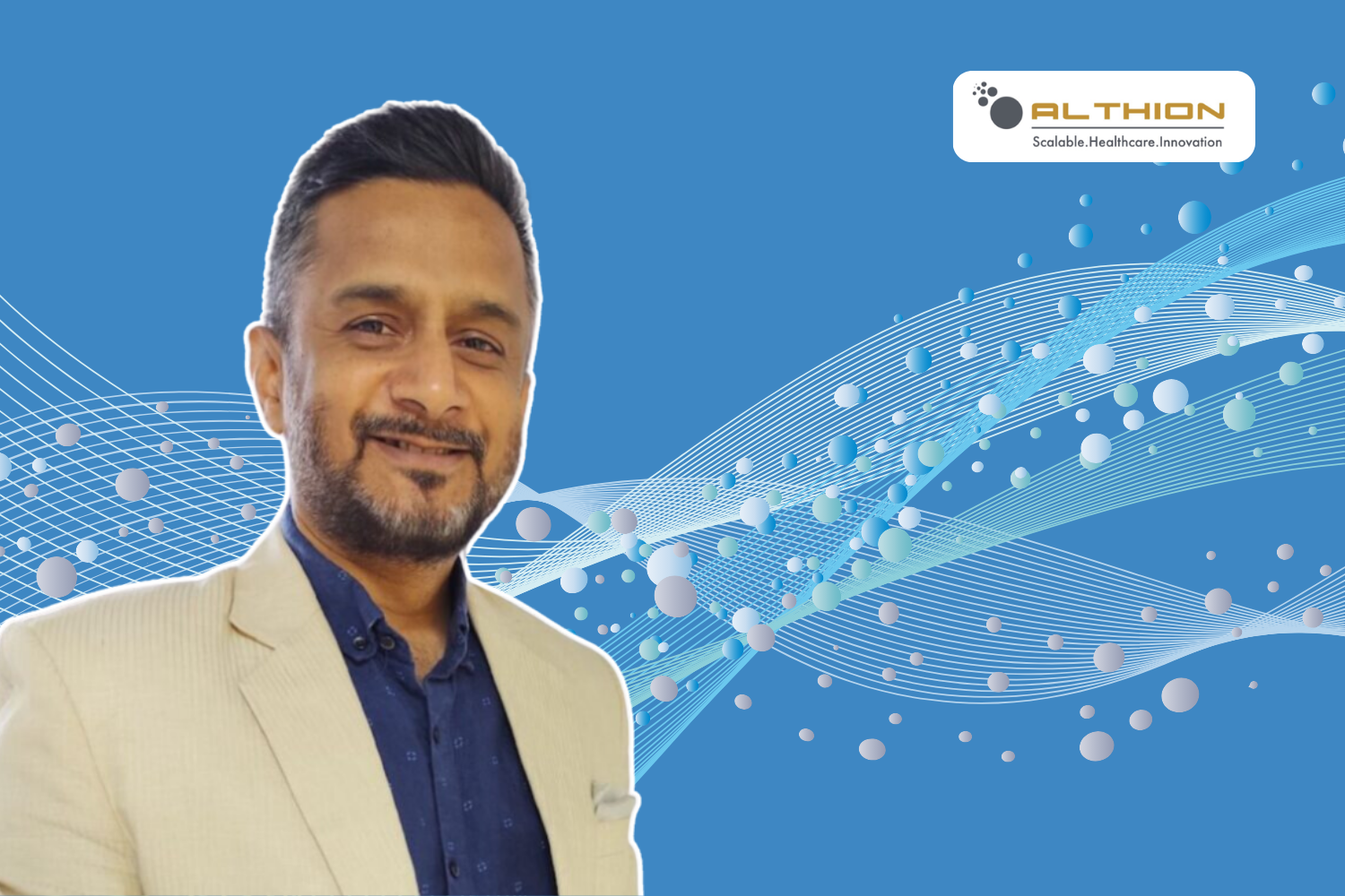 A professional banner featuring a smiling man in a beige blazer against a dynamic blue background with abstract wave and dot patterns. The design includes the Althion logo in the top-right corner with the tagline "Scalable. Healthcare. Innovation."