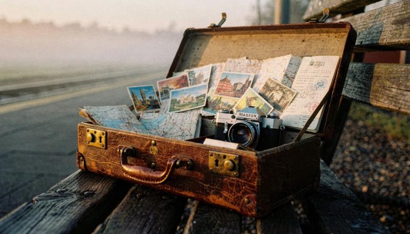 freepik  old leather suitcase resting on a wooden train pla  58864