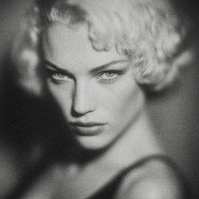 monertov Black and white studio portrait of a blond woman lit 48796f3e abe5 4222 a68a 7d9093840dff 3