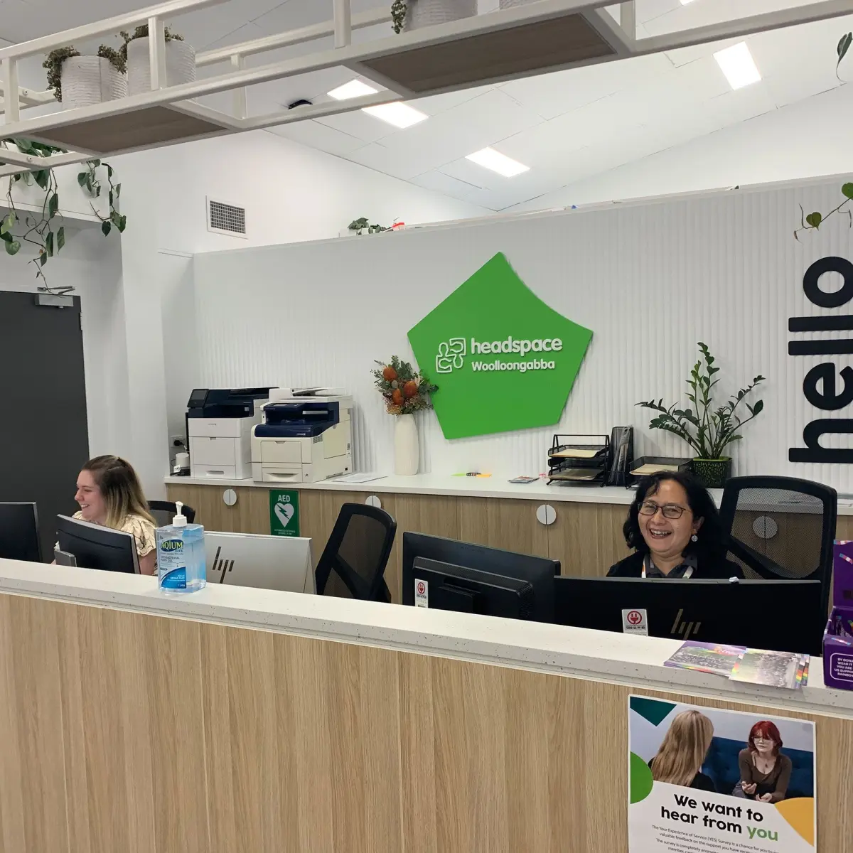 Two women at reception desk