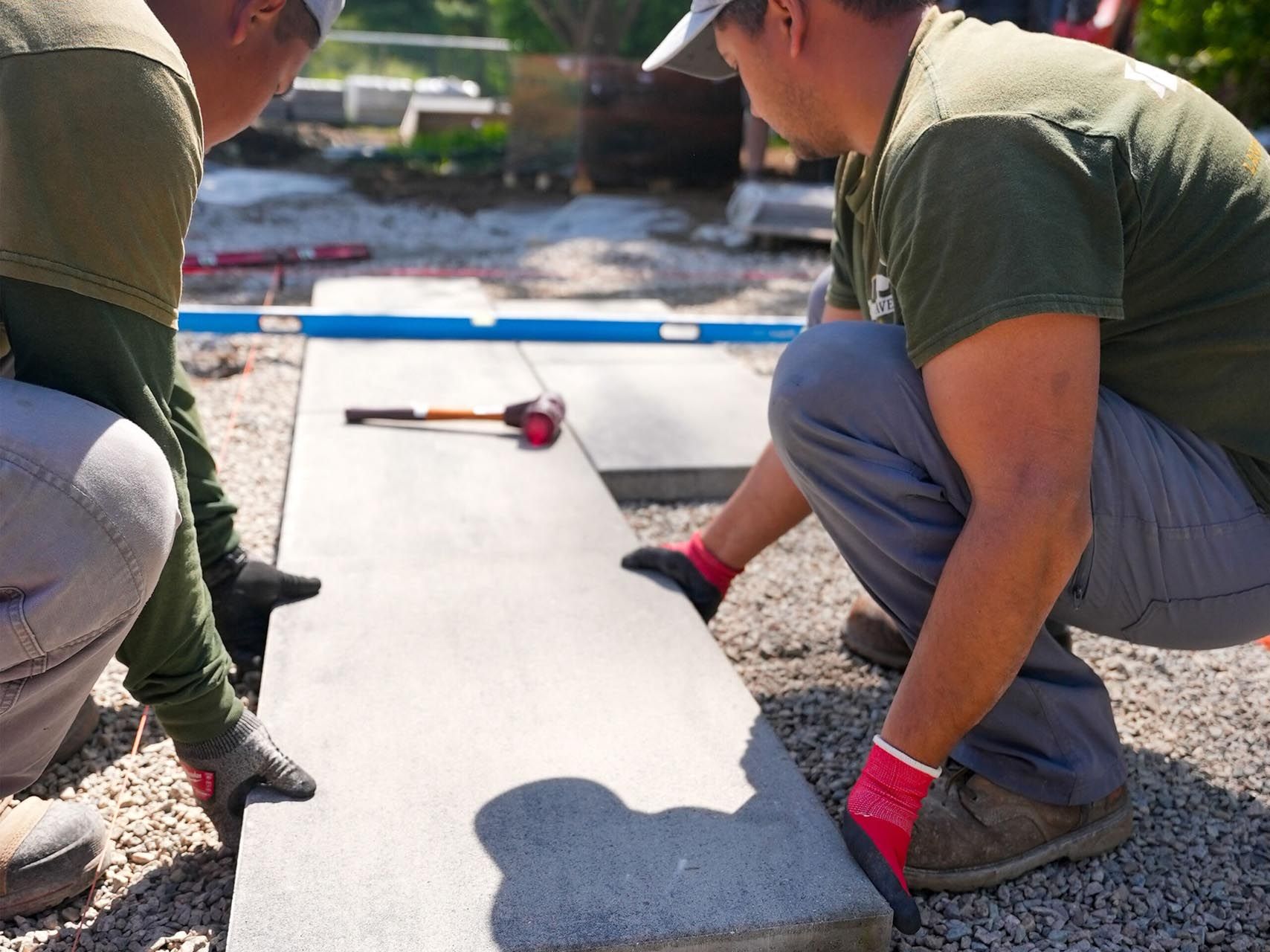 Residential hardscaping walkway and stone steps under construction by Contrast Landscape