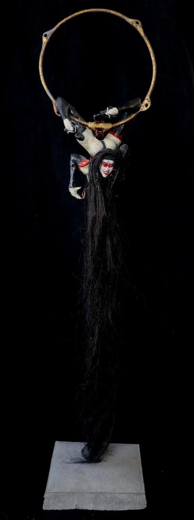 a twisted muse with a mischevious smile