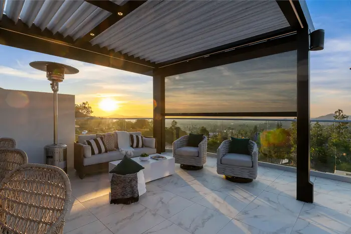 Patio with power screen and louvered pergola