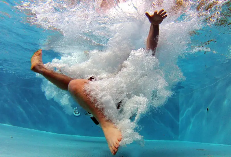 Kid playing in a Pool