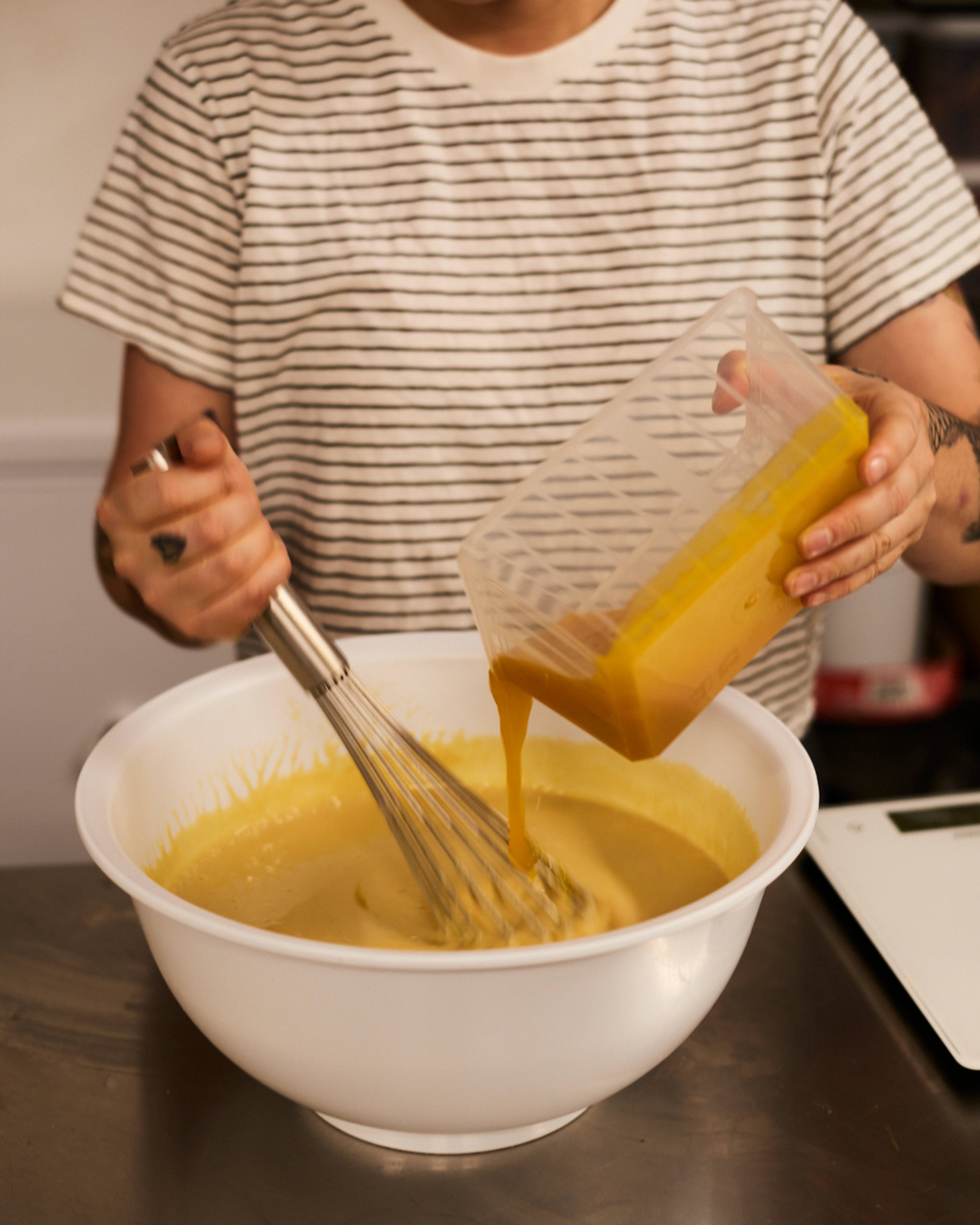 mixture being poured in a bowl