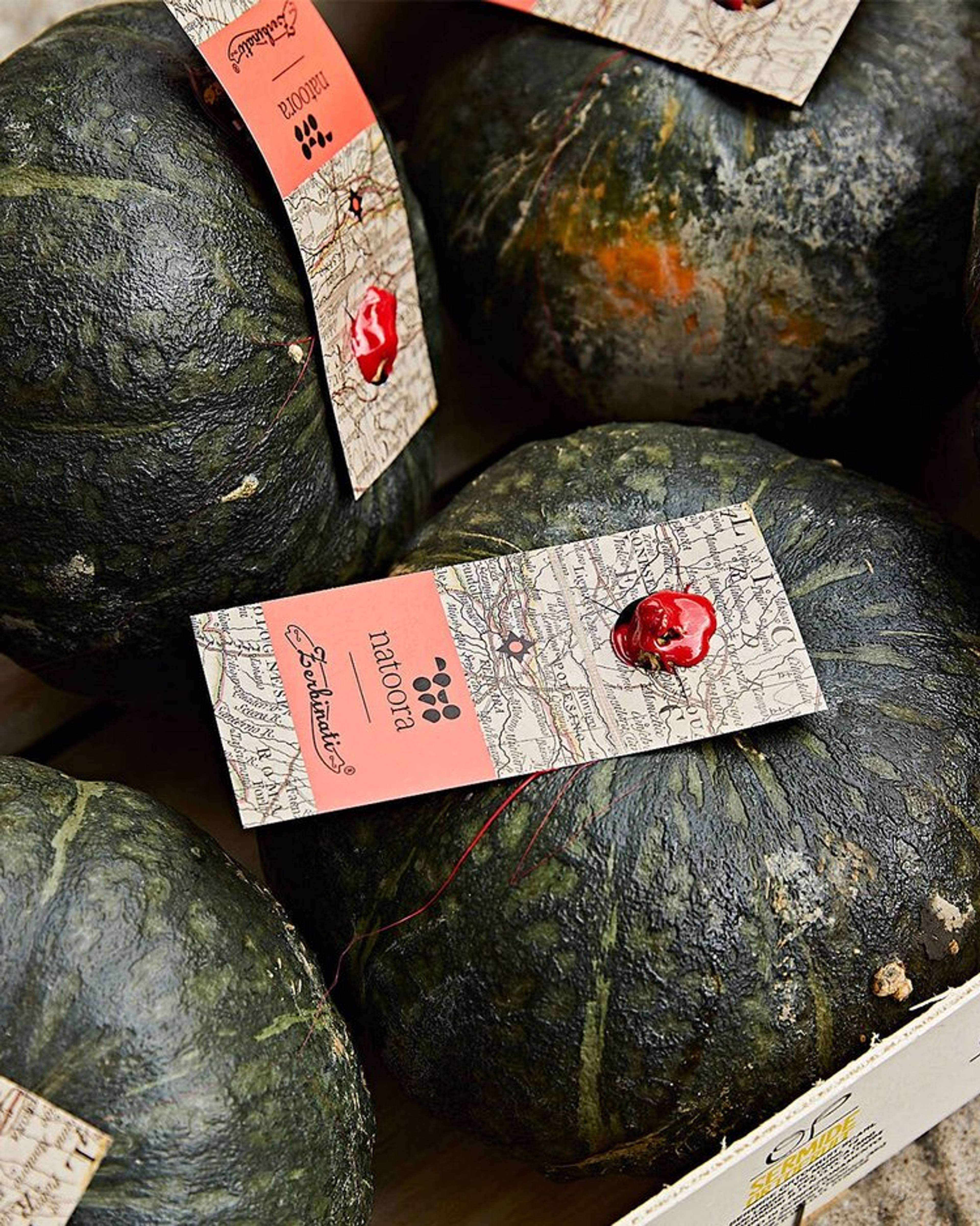 Natoora Delica pumpkins in a crate