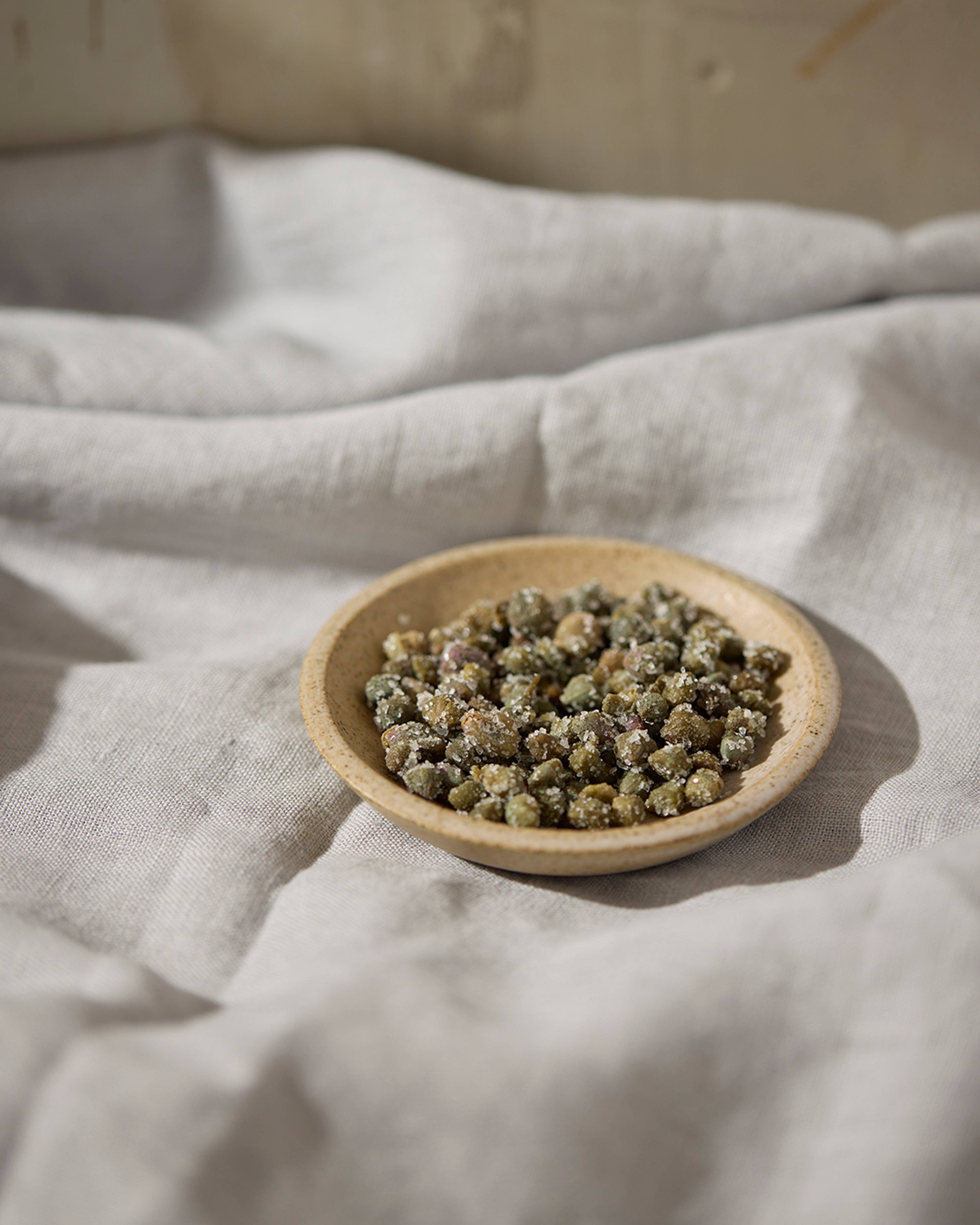 caravaglio capers on a small plate