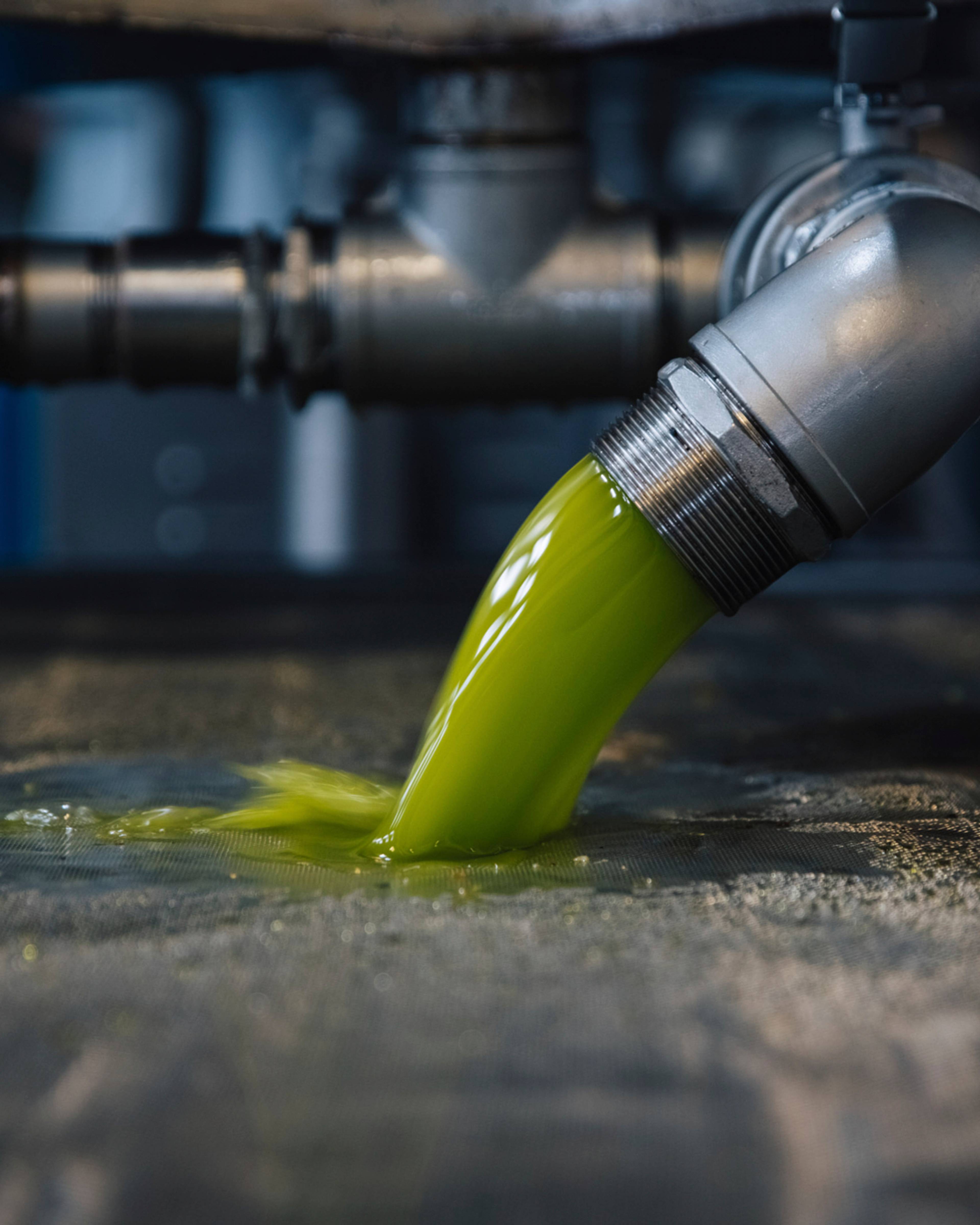 oil coming out of the tube in vibrant green colour
