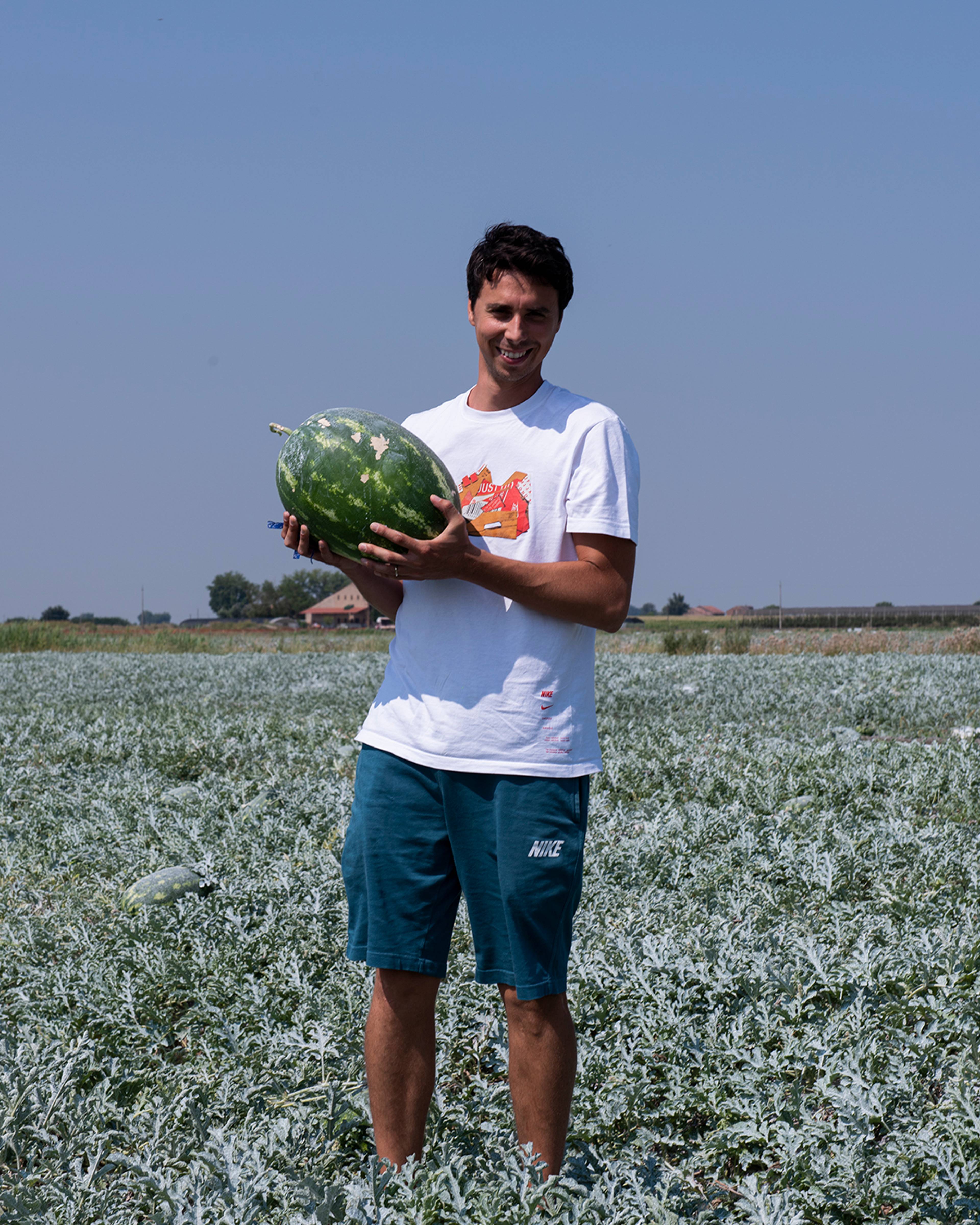 oscar holding a zerbinati watermelon in the field