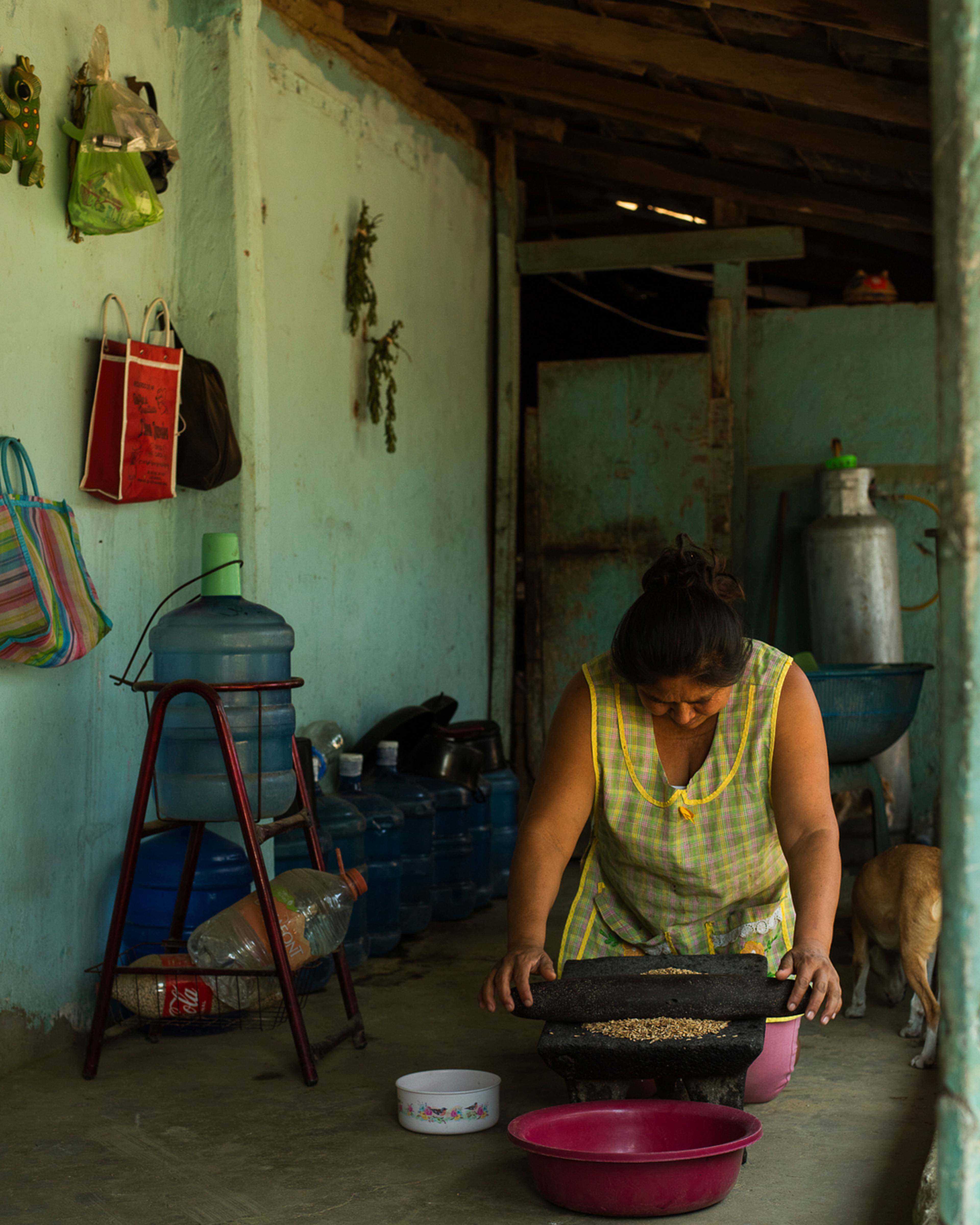 woman making masa