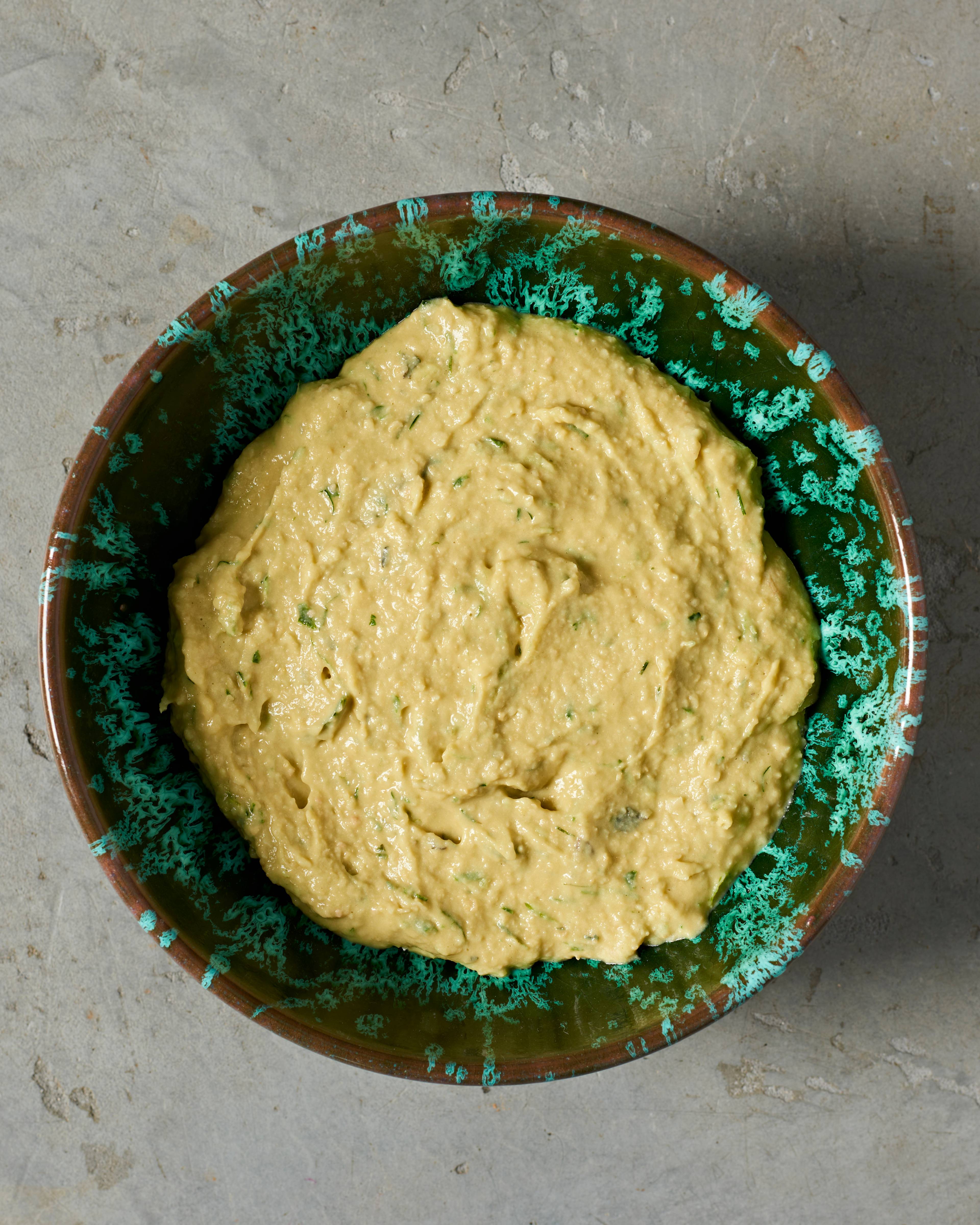 herb hummus in a bowl