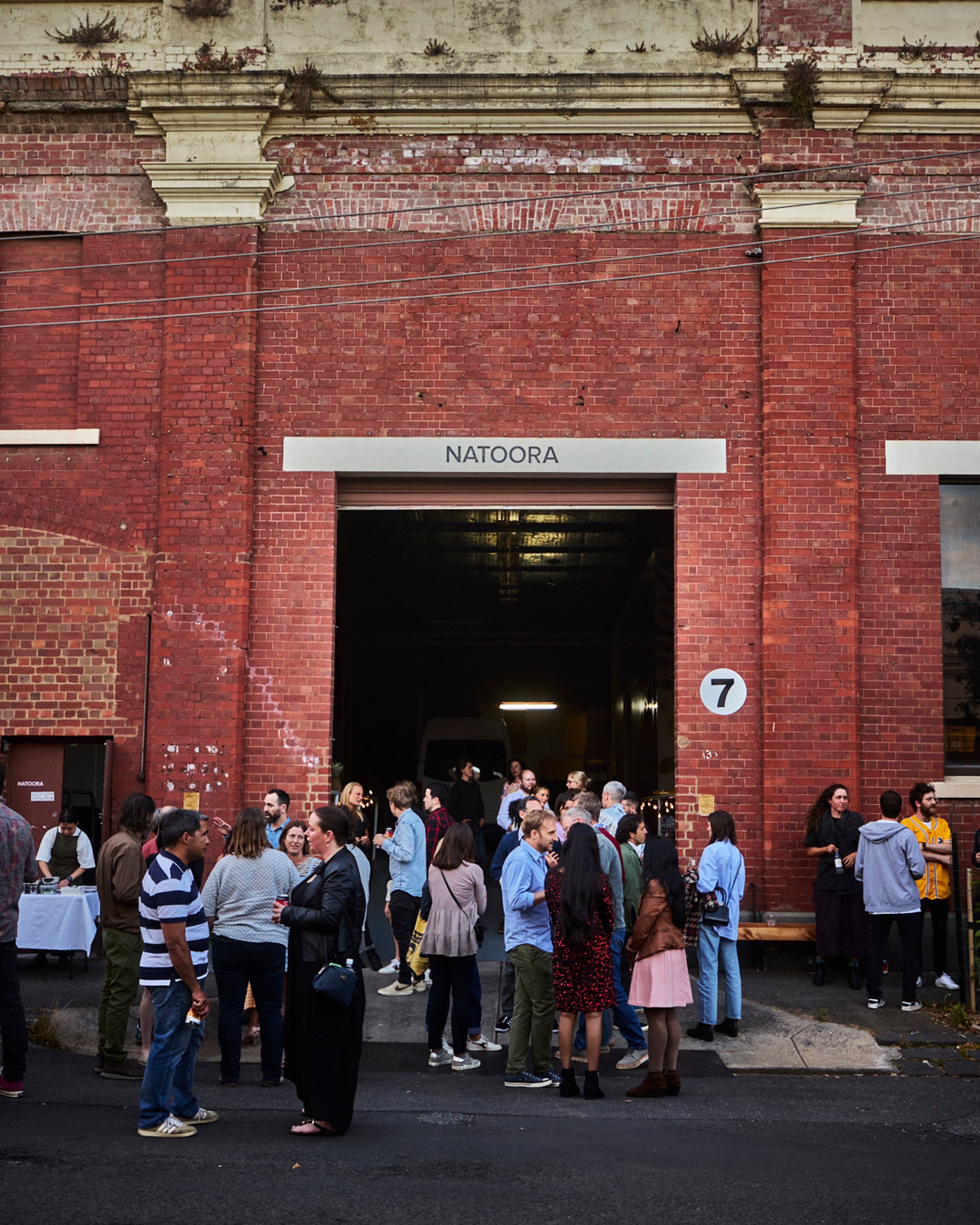 Group of people outside the Melboure warehouse at the launch party