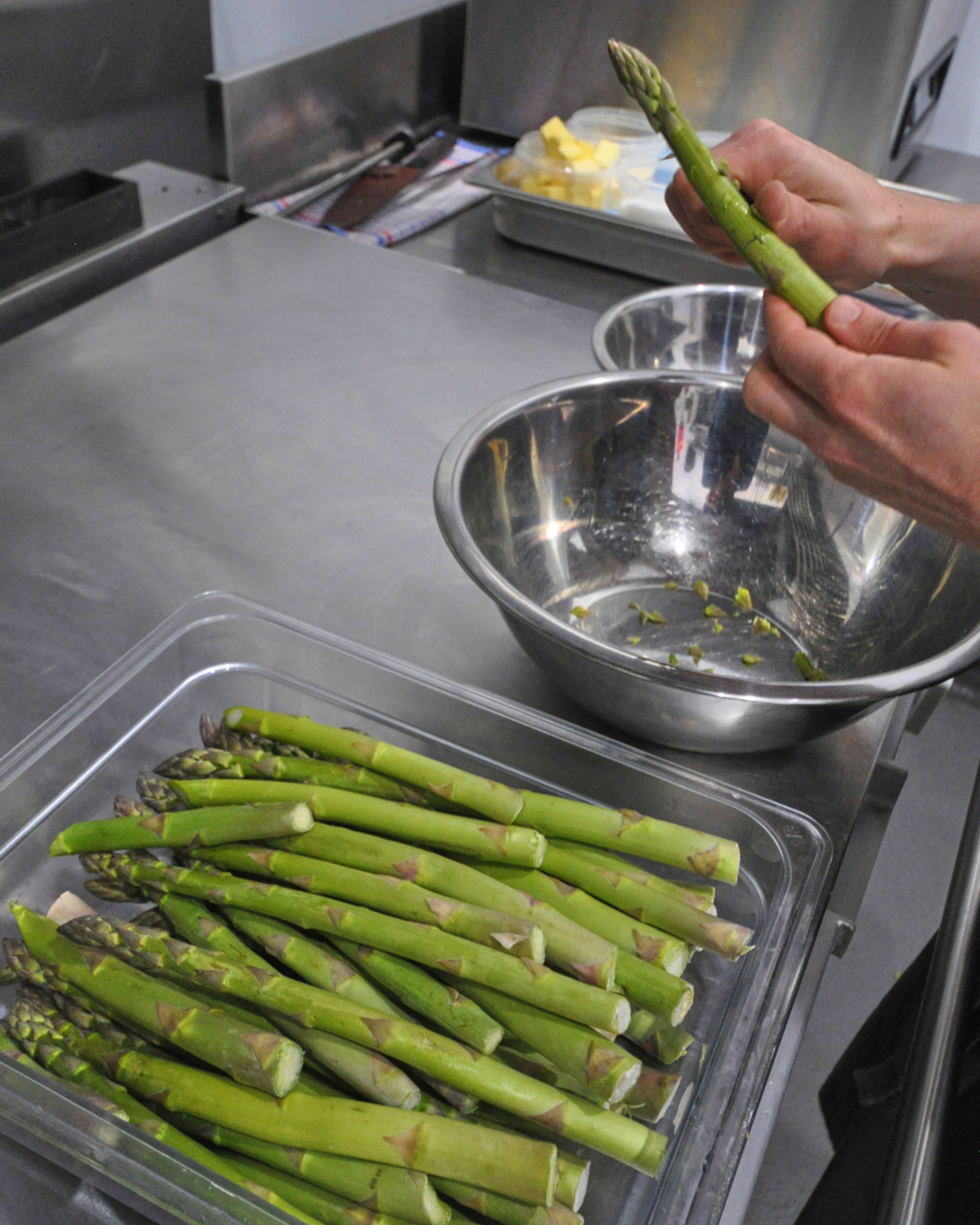 trimming asparagus stalks