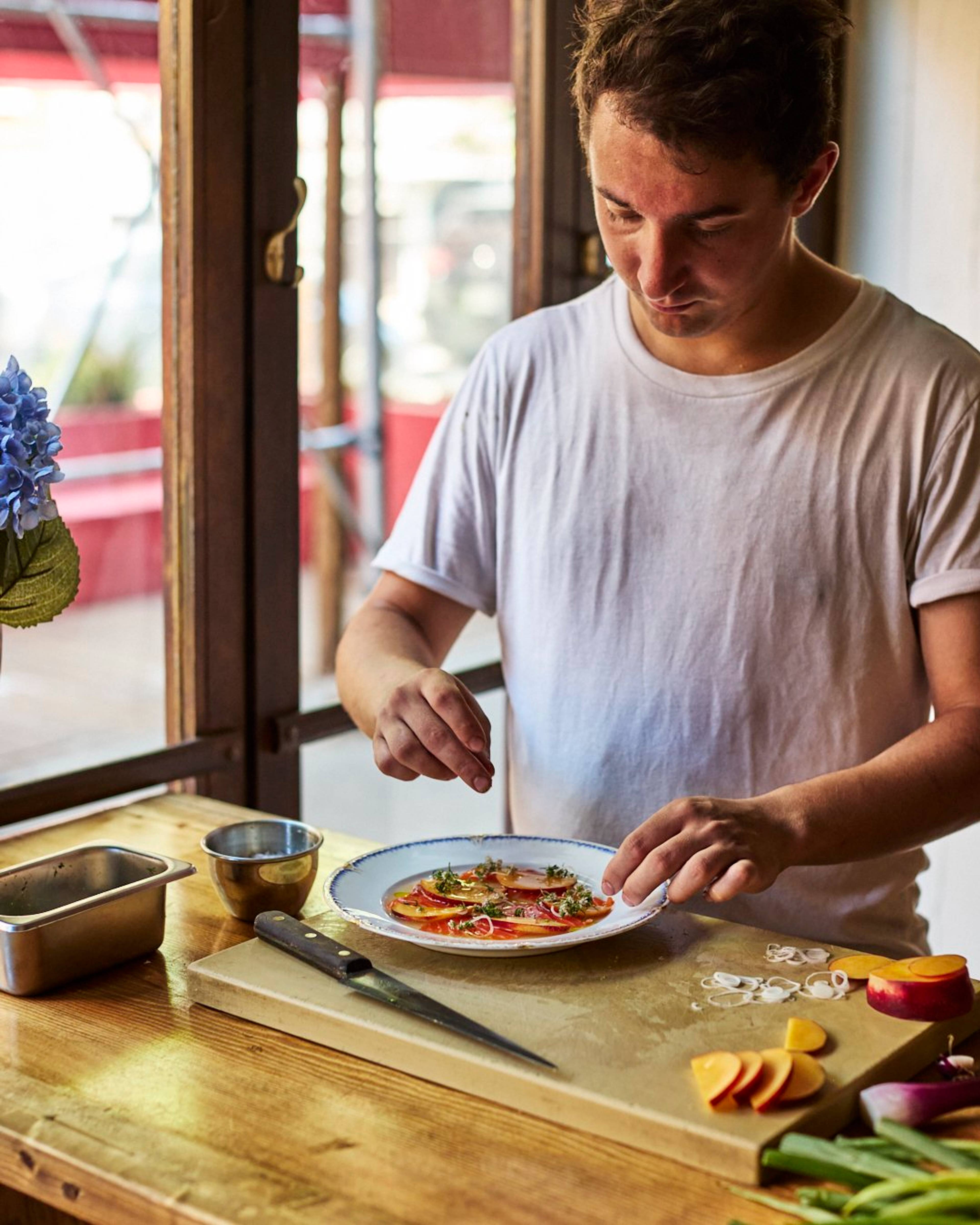 Ed garnishing the final plate