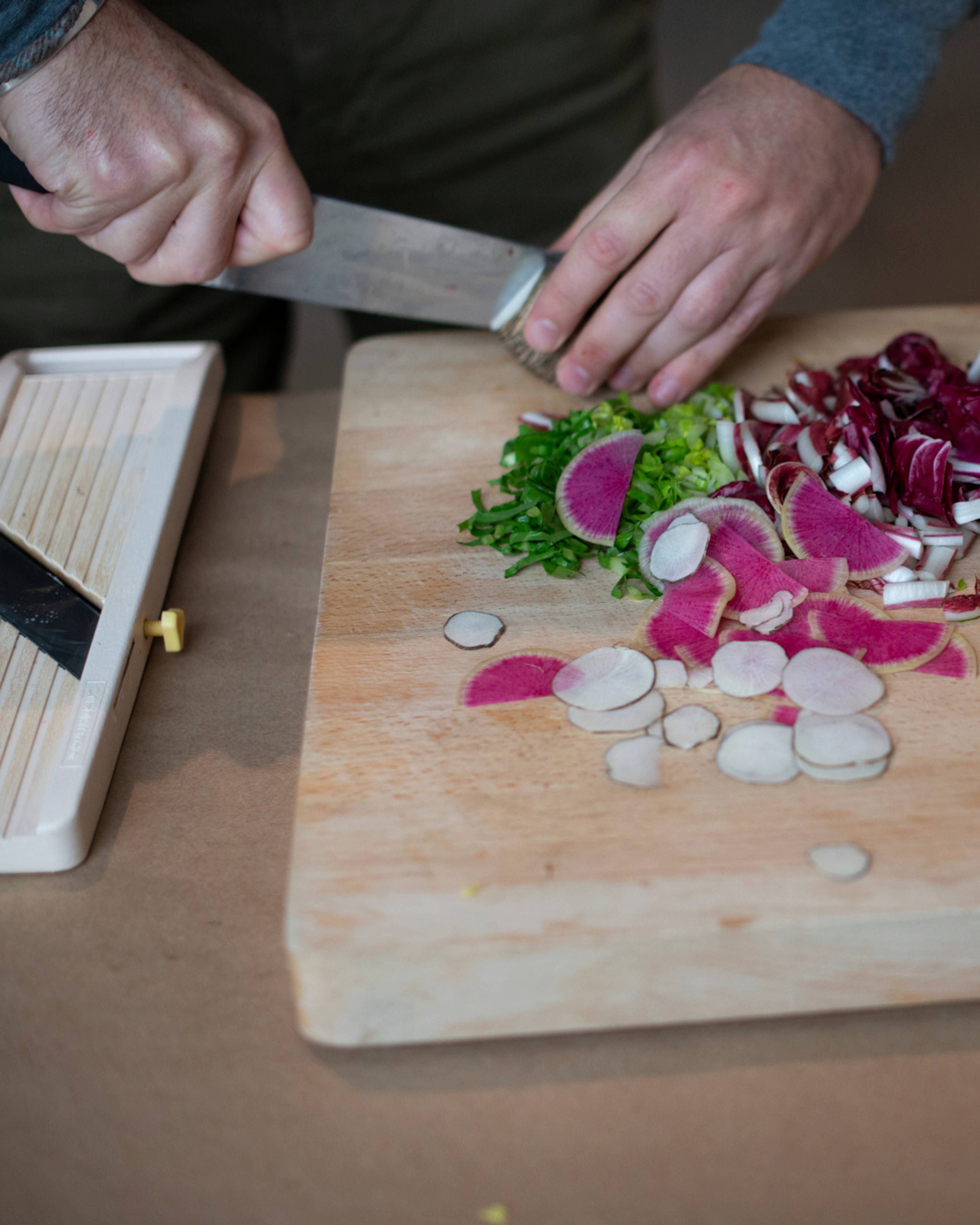chopping the salad ingredients