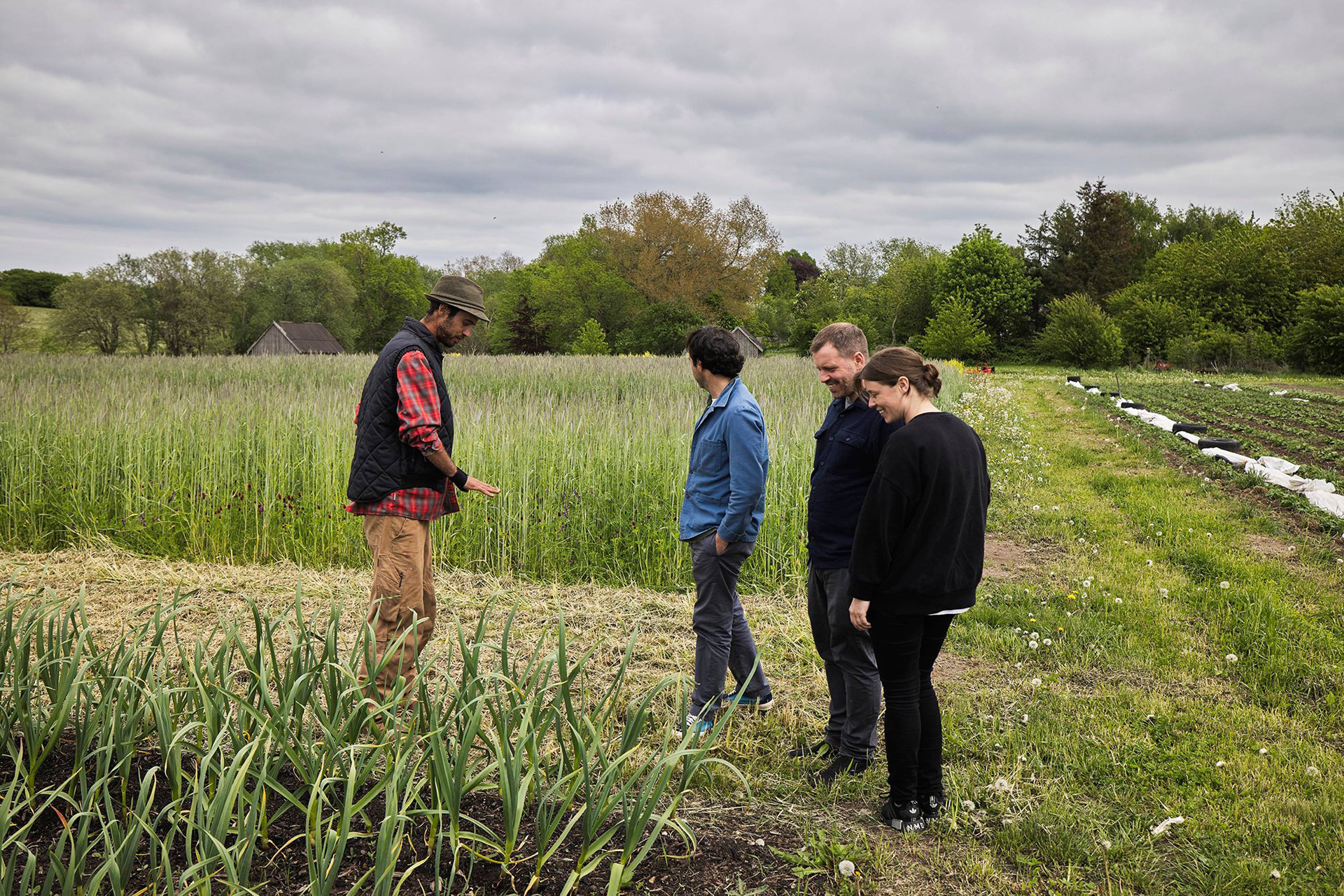 Sam and the team visiting a farm in Denmark