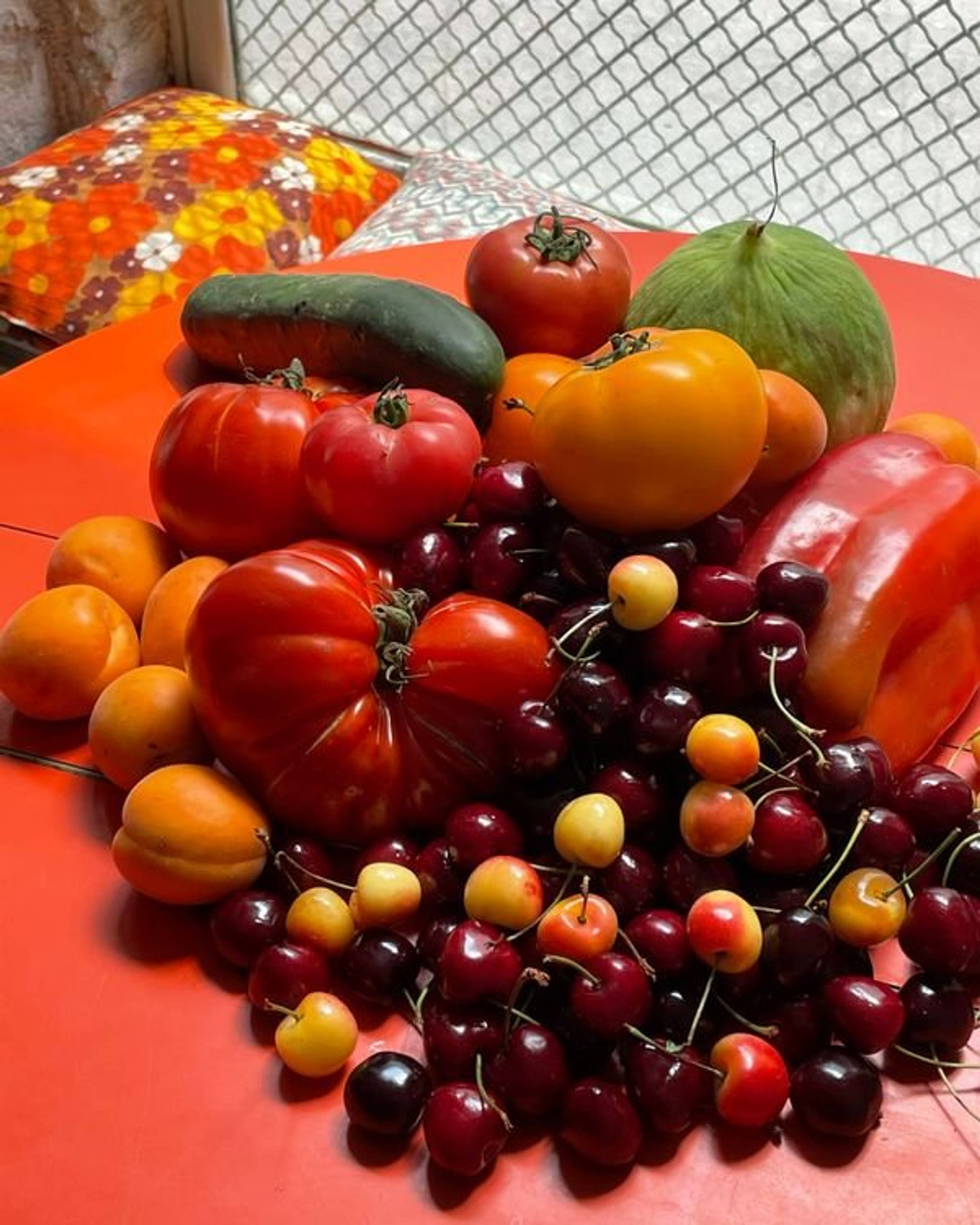 ingredients laid out including cherries tomatoes melons