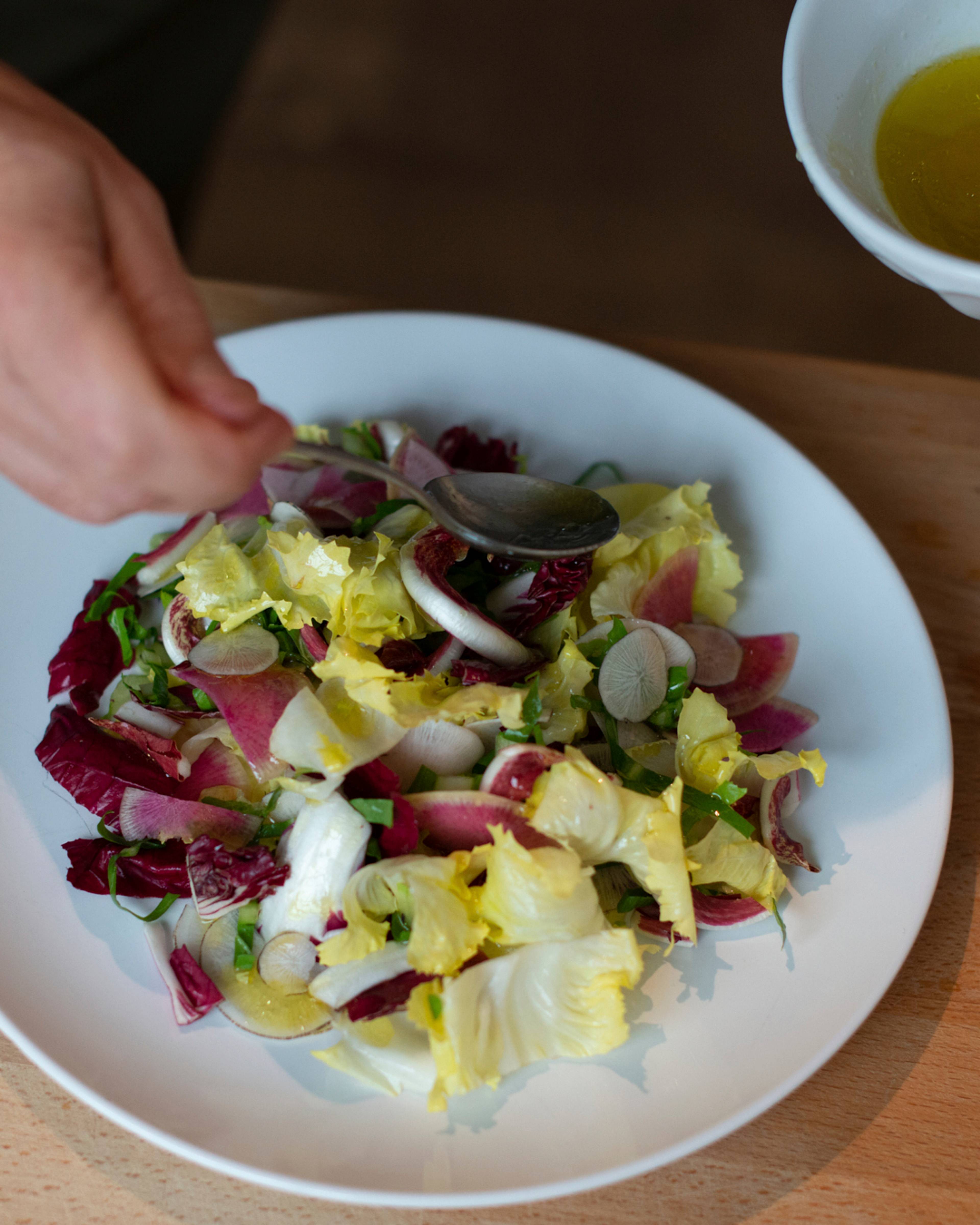 dressing the radicchio salad
