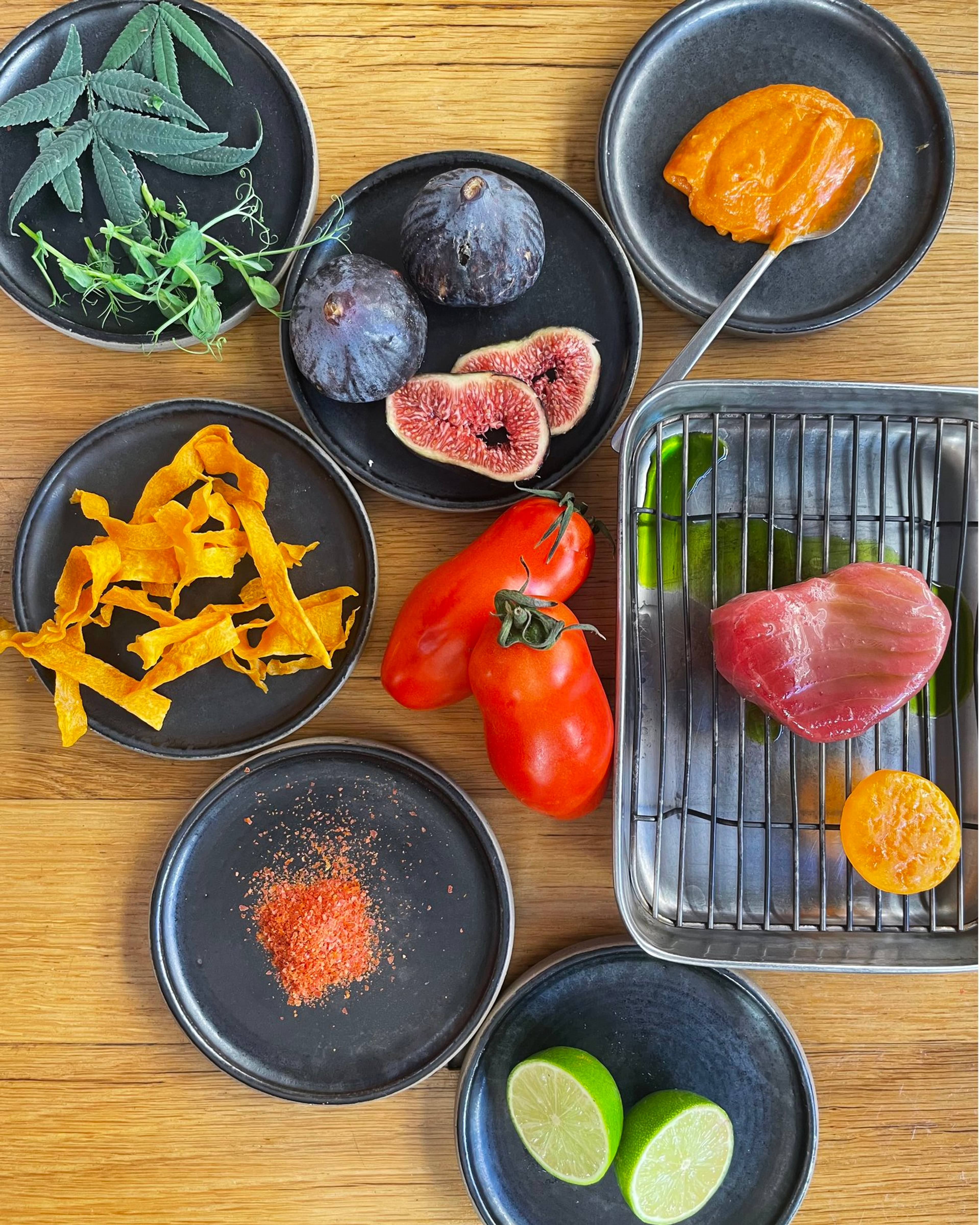 All ingredients for the raw tuna recipe laid out on plates