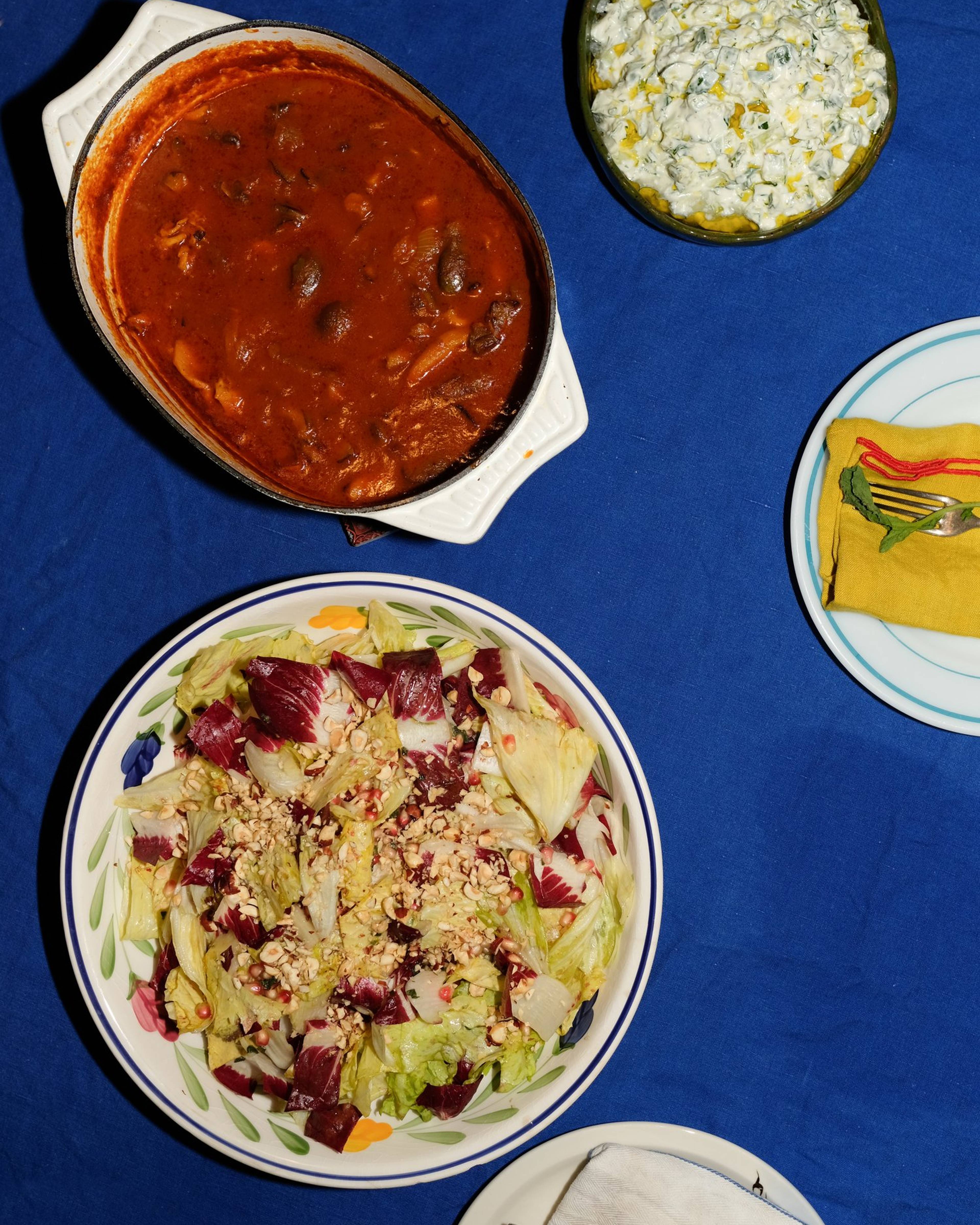 radicchio salad served on a plate on blue tablecloth